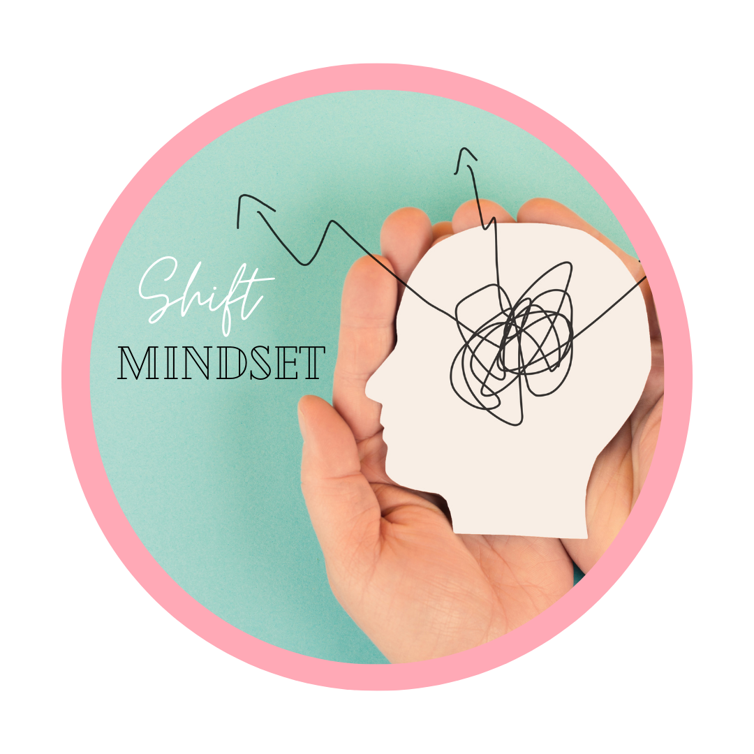 A hand holding a paper cutout of a human head with a chaotic scribble and arrows pointing outward, symbolizing a shifting mindset.