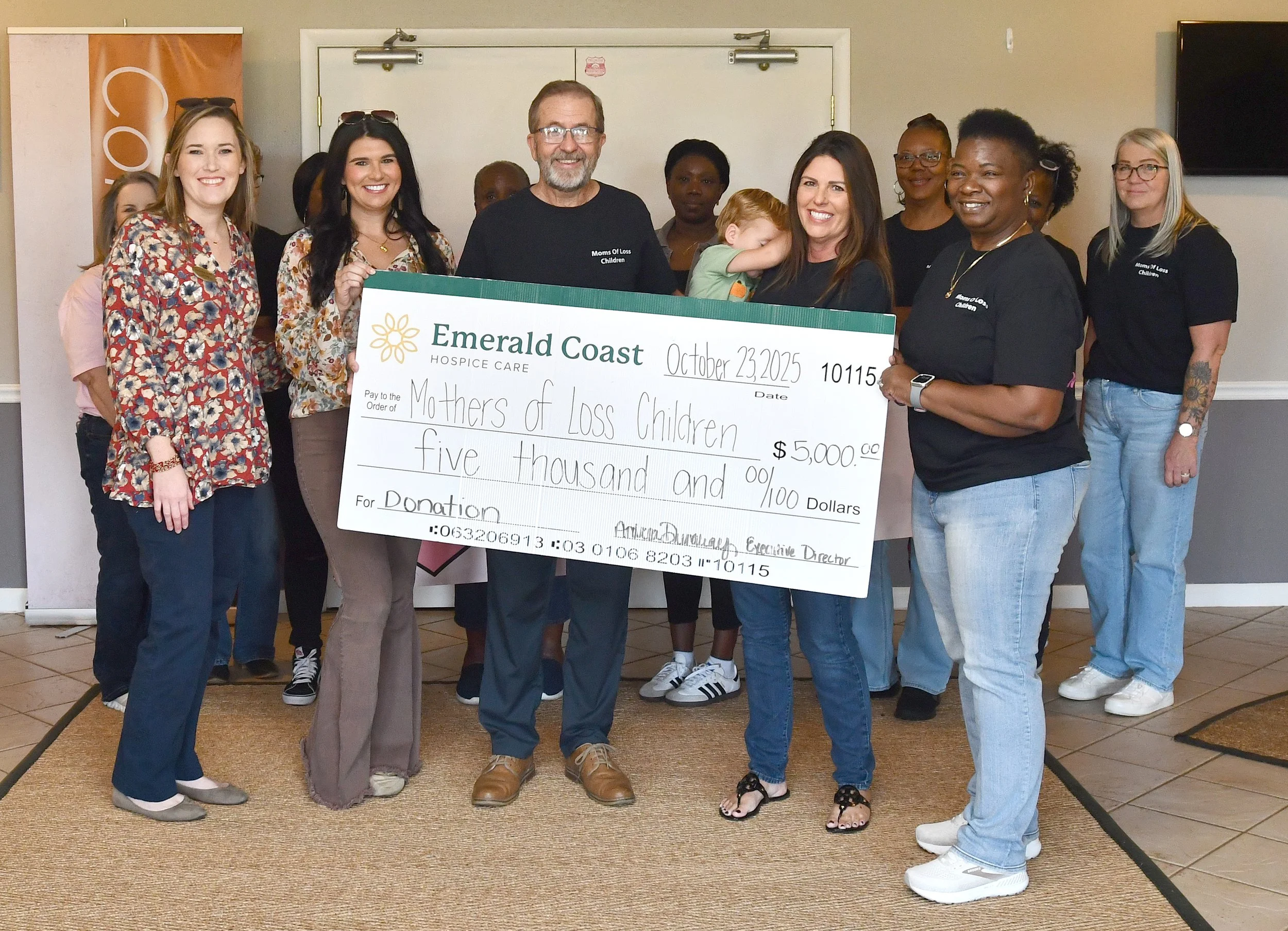 M.O.L.C. Celebrates Ribbon Cutting, Receives $5,000 Gift for Families in Crisis