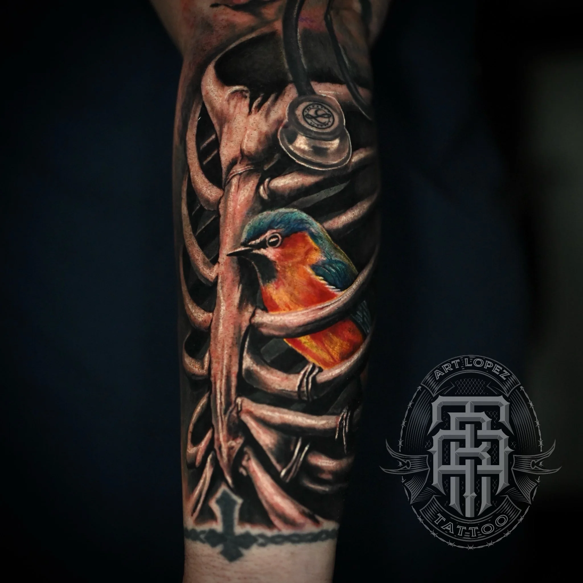 BIRD CAGE COLOR TATTOO REALISM ILLUSTRATIVE FOREARM MEMPHIS TN TATTOO ARTIST