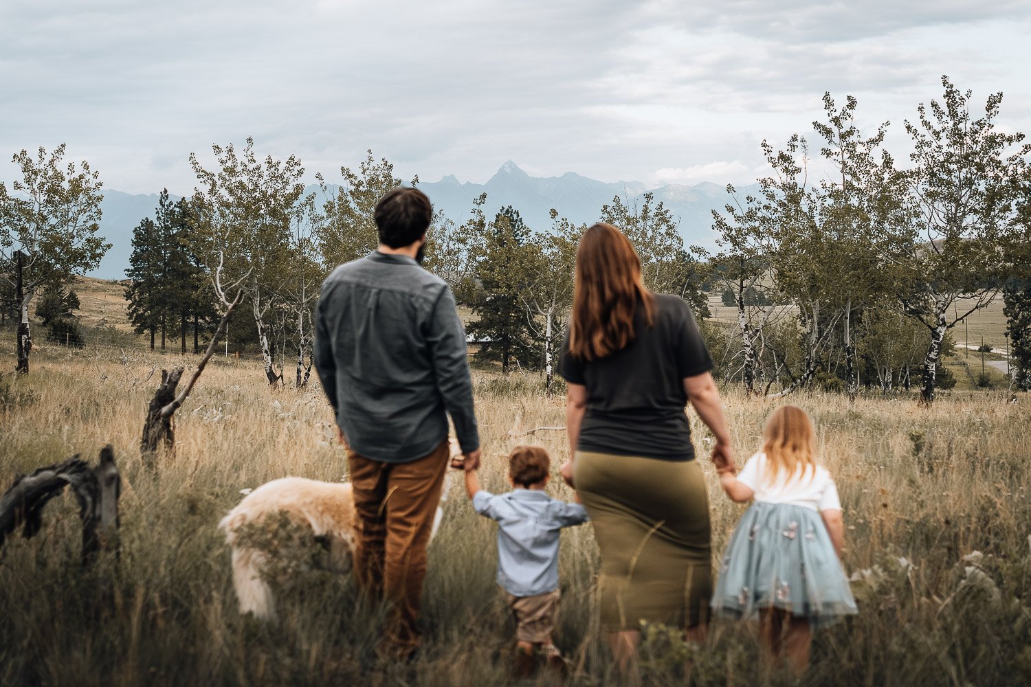 Family photo with mountains in background