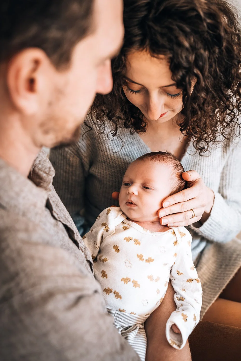 Mom and dad portrait with newborn in Kimberley.
