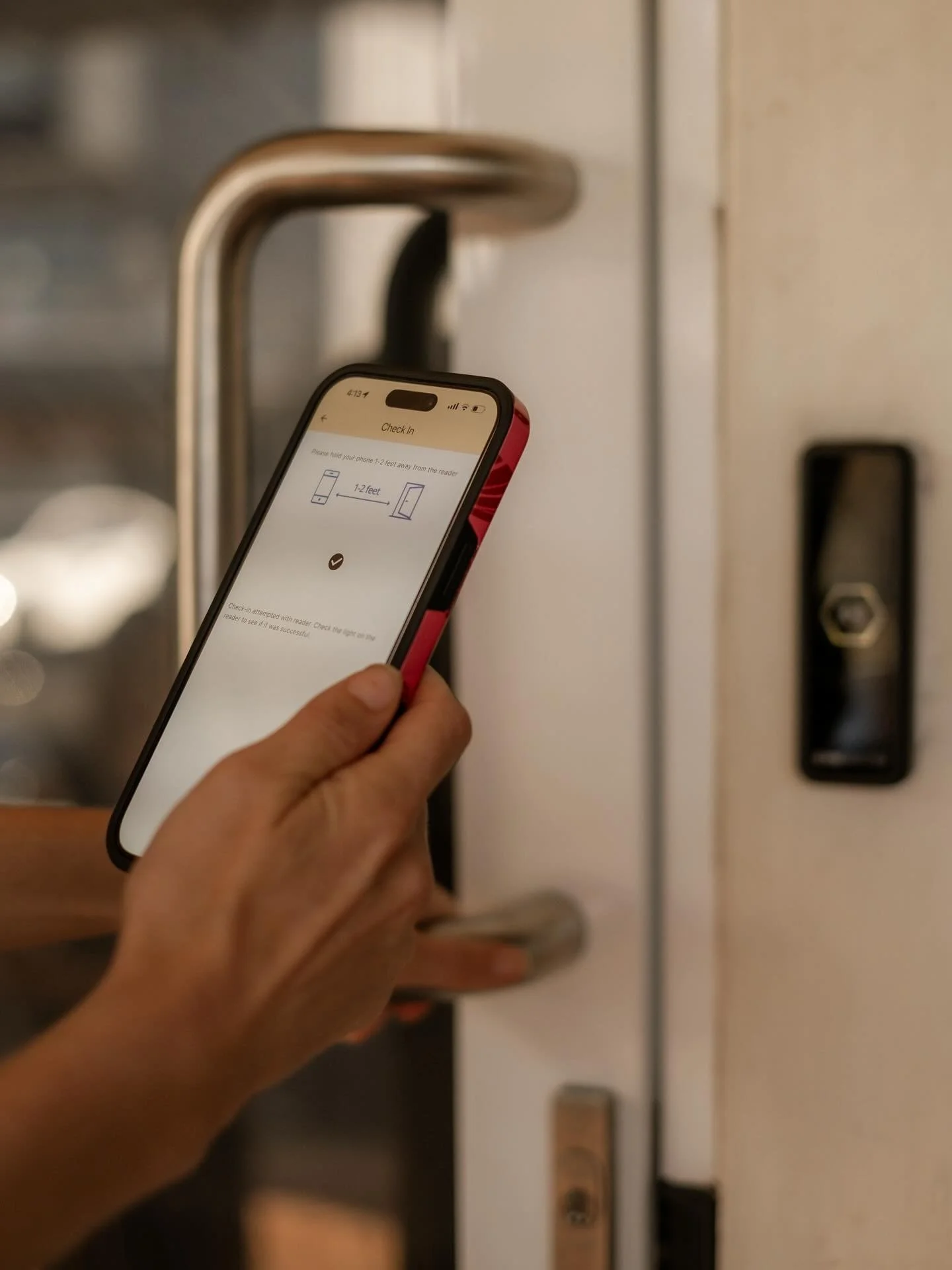 Hold your door access app near the door and pull/push when you hear the click. The app will tell you access is granted and the door will unlock for 2 seconds before it locks again so pull/push as holding your phone next to reader for smooth access.