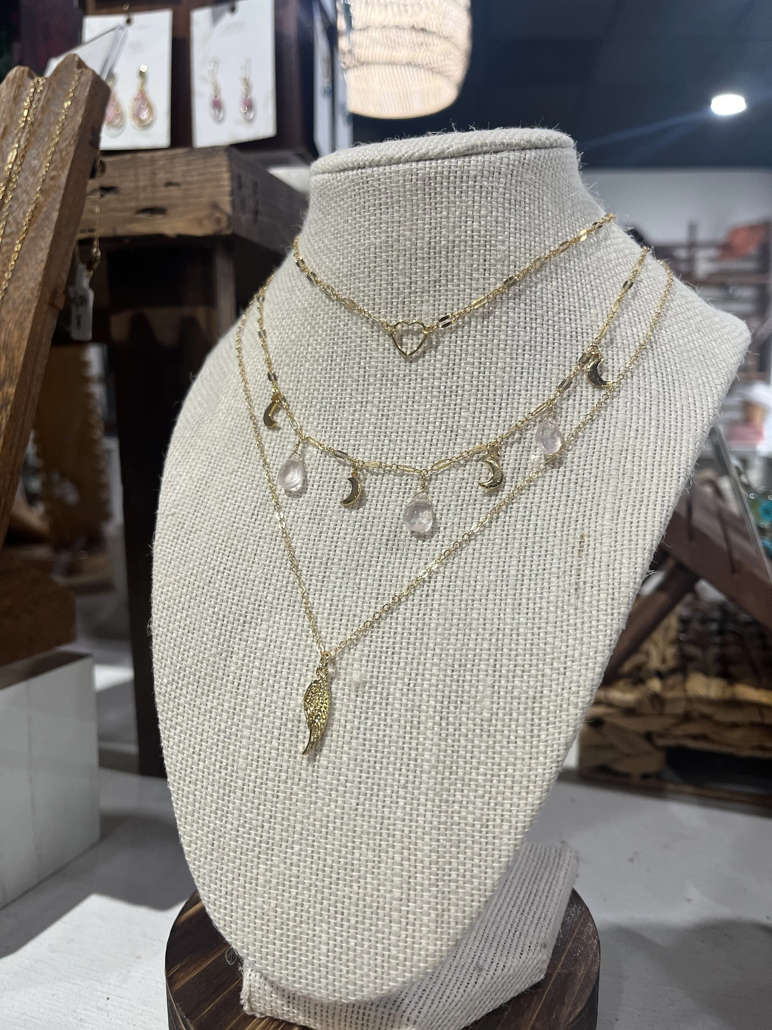 Handmade knife handle vases with dried flowers, displayed on a black board with magnetic backing for unique home décor or gifts. Available at Rustic and Modern Collective in Upland, CA.