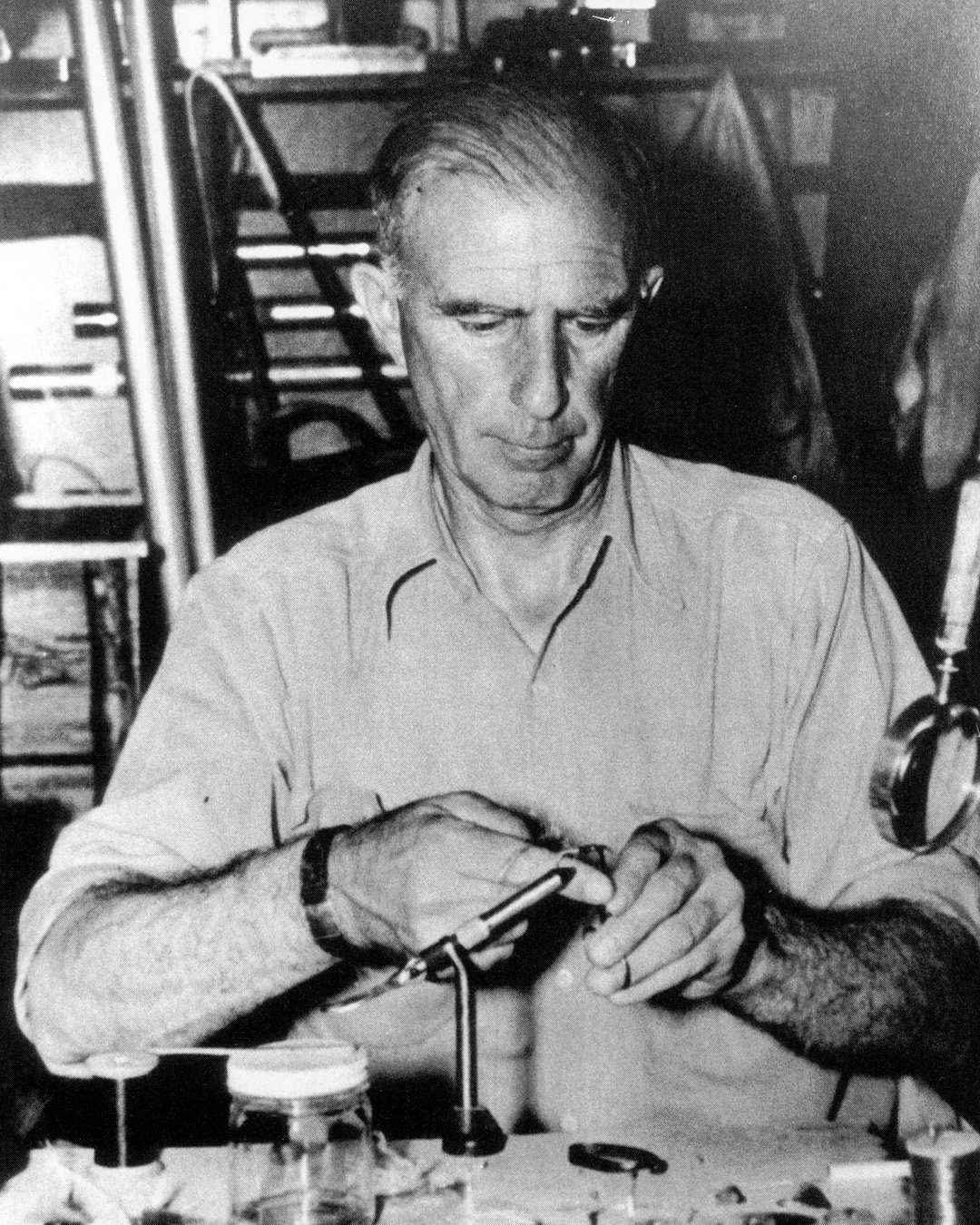 Clarence Gordon at his fly tying bench at the Steamboat Inn