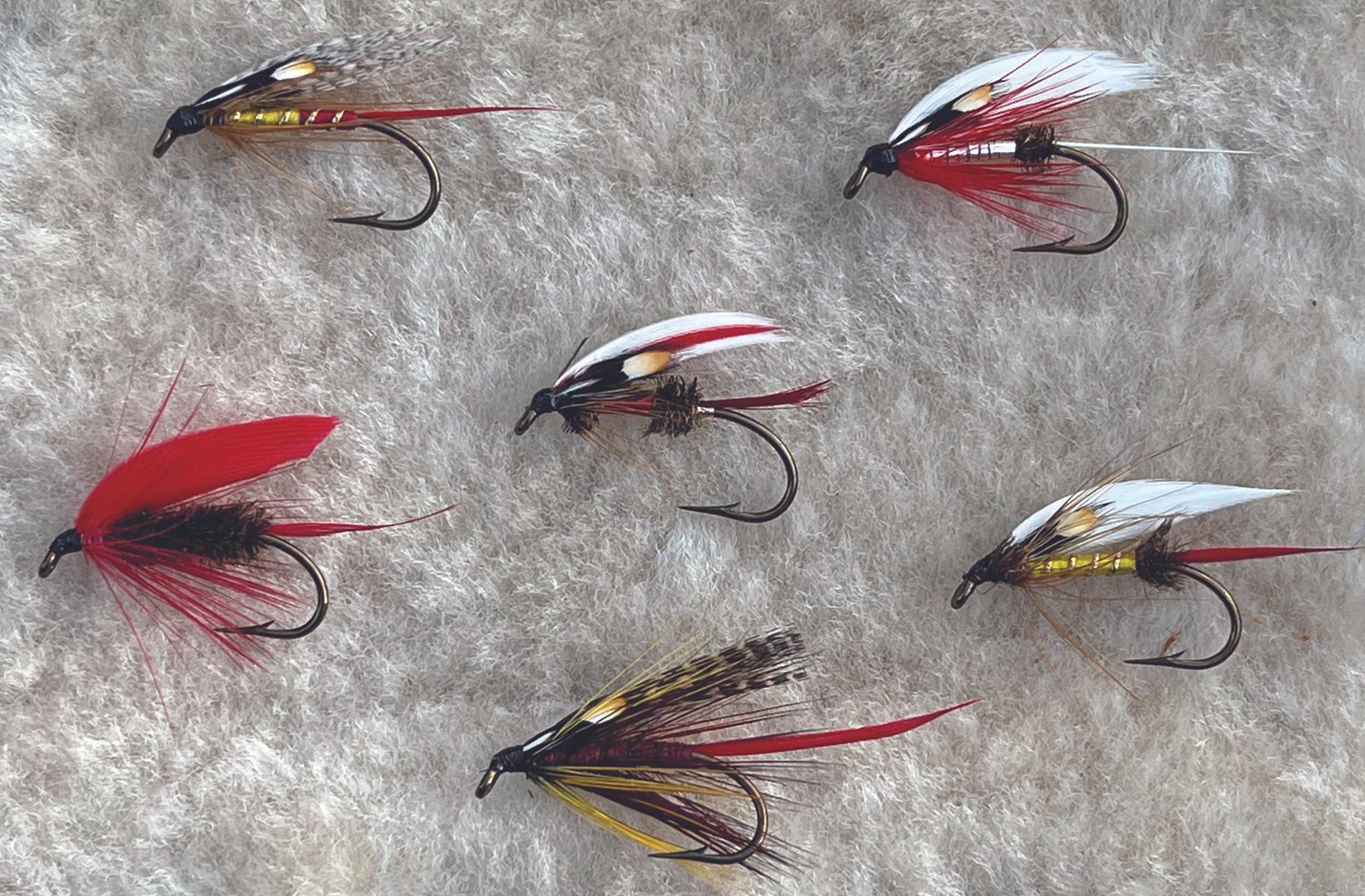 Dave McNeese’s re-creations of John Benn’s flies for steelhead, top left to right: Martha, Silver Admiral. Center: Carson, Coachman, Van Zandt, Soule. Bottom: Railbird.