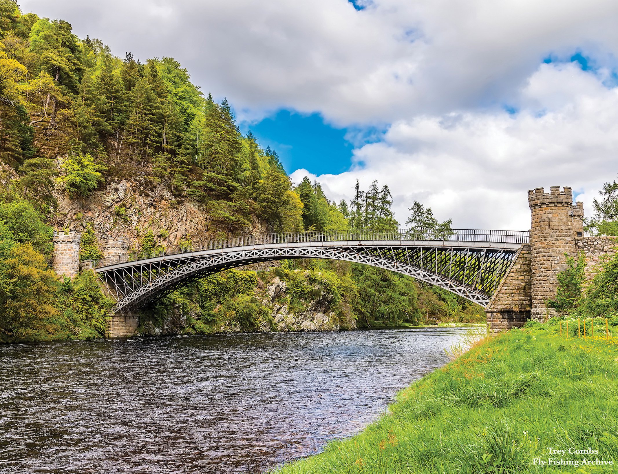 Archival River Plate #1: A scenic view of the Macallan Beat on the lower River Spey in Scotland, featuring the historic cast-iron Craigellachie Bridge designed by Thomas Telford.