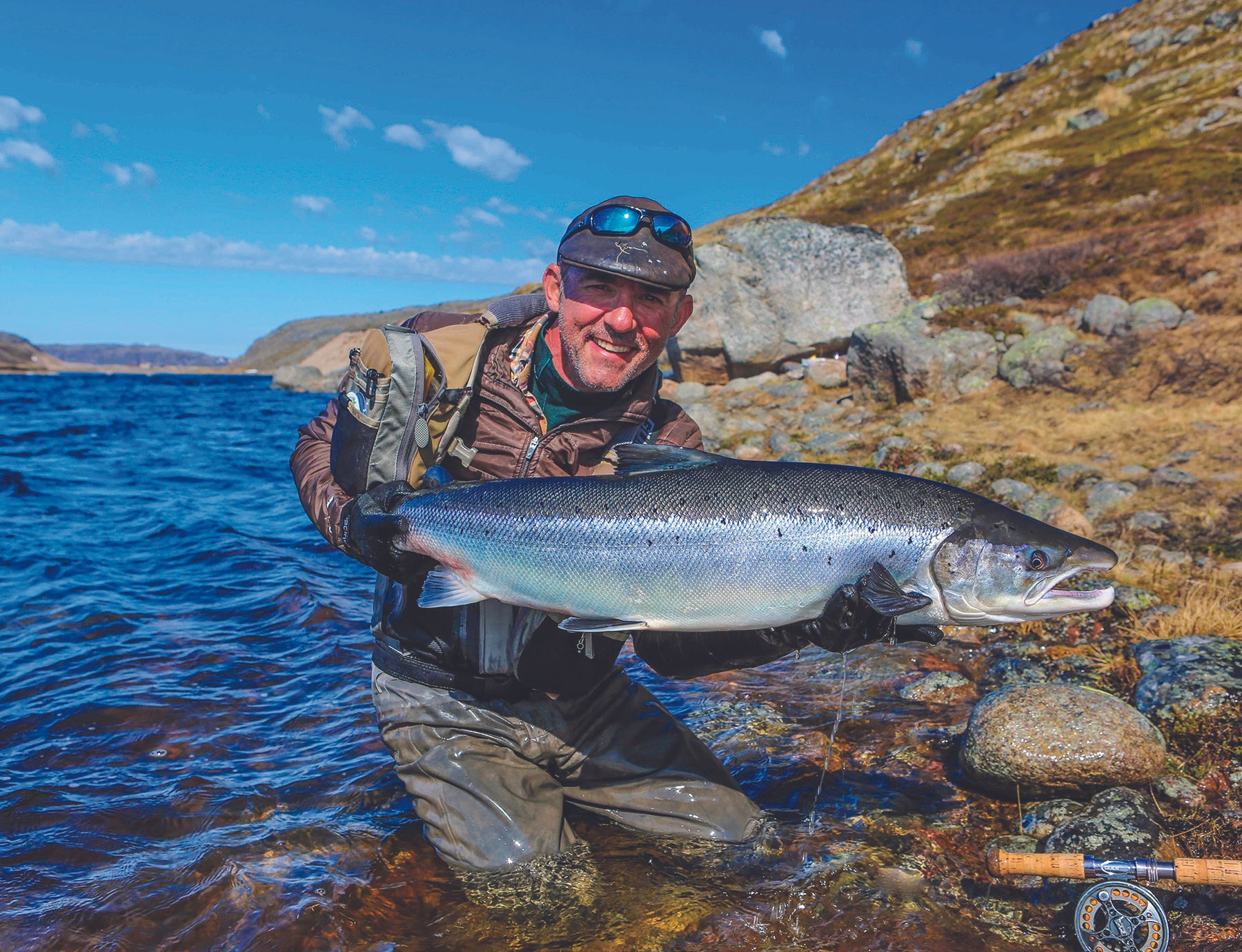 imager of mikael frodin with salmon