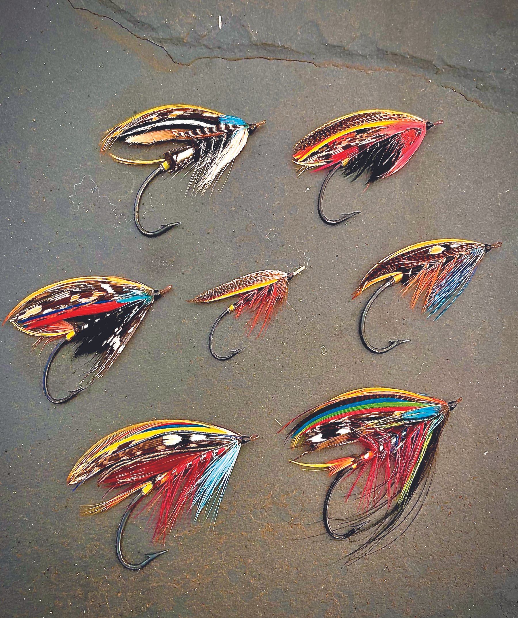 image of fly plate of syd glasso tied salmon and steelhead flies