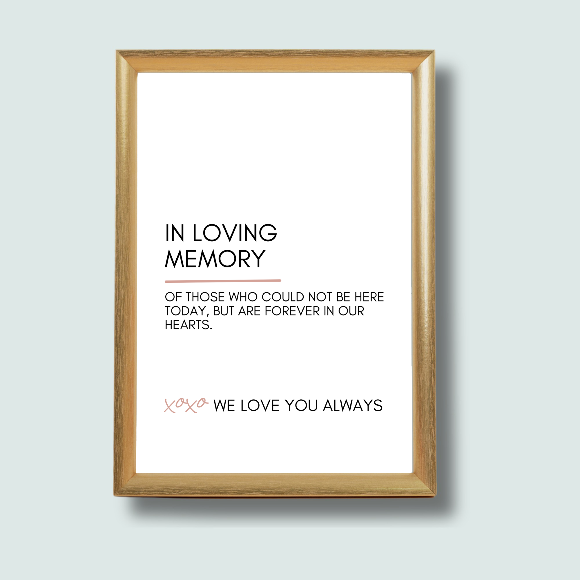 A framed memorial print with the text 'In Loving Memory of those who could not be here today, but are forever in our hearts. We love you always' on a light background.