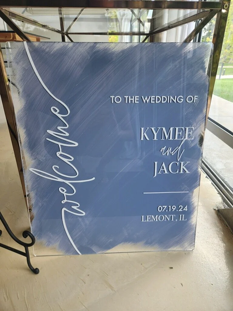 Welcome sign for the wedding of Kymee and Jack, held on July 19, 2024, in Lemont, Illinois.