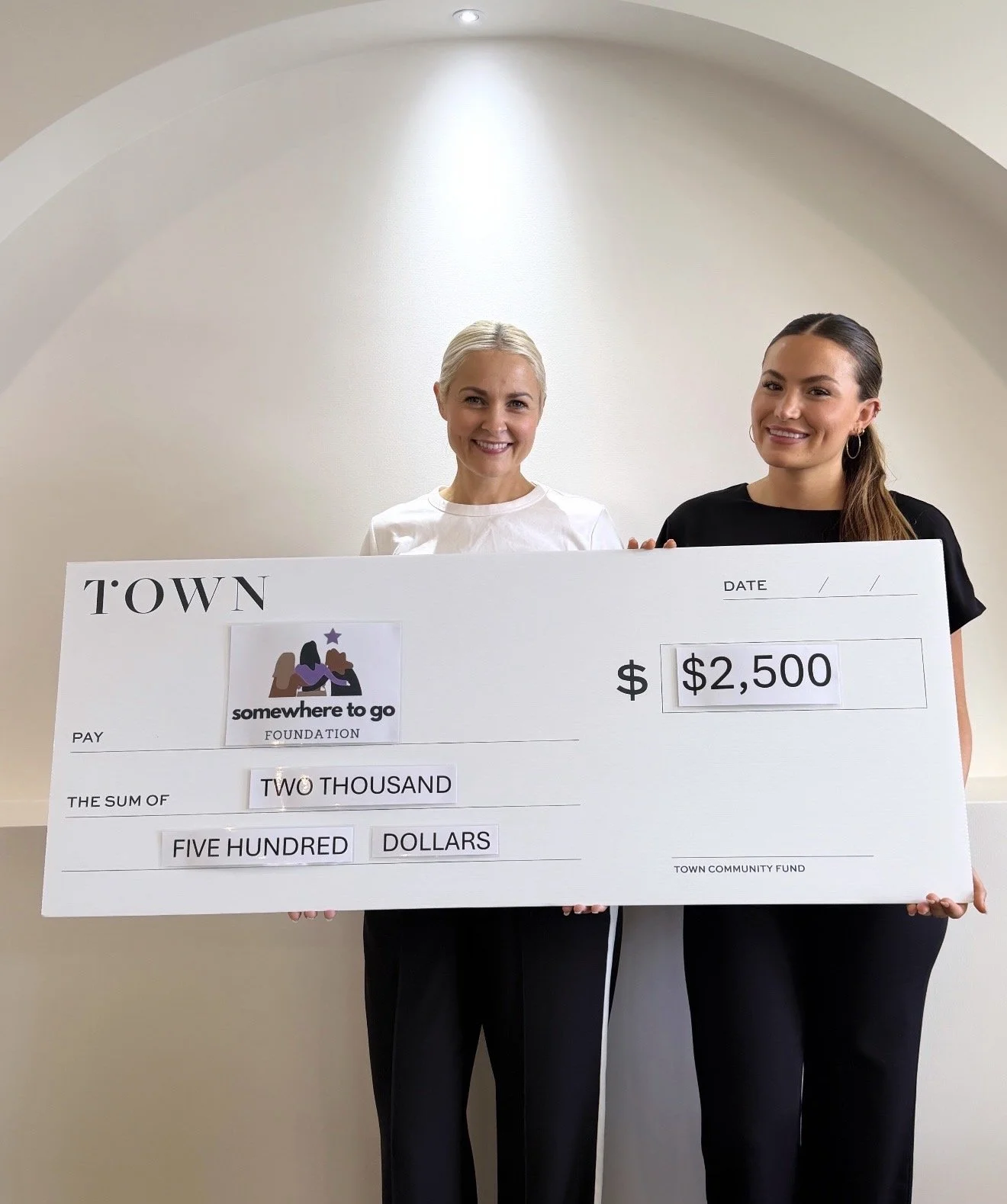 Donation check from TOWN Realestate