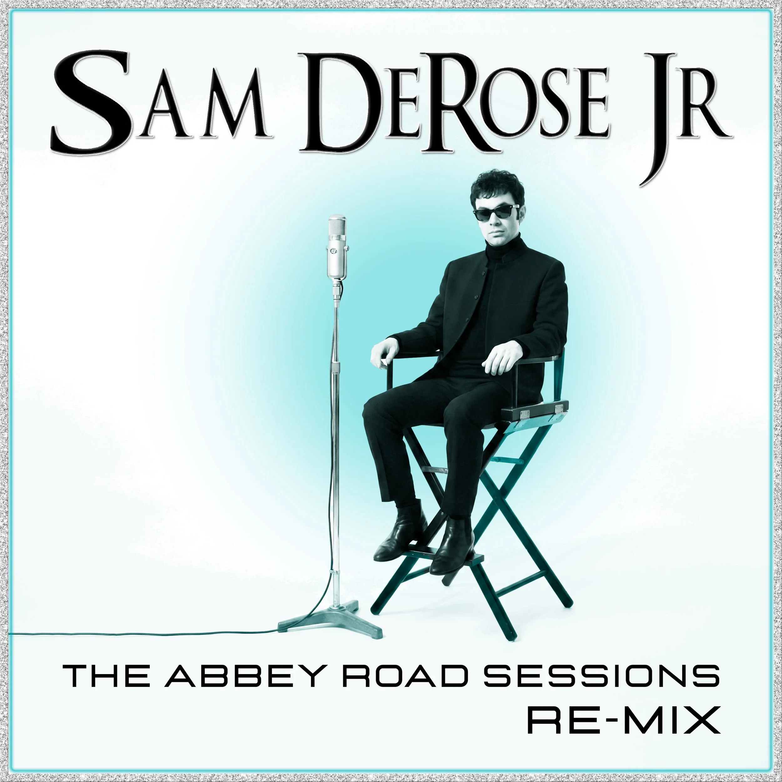Album cover image for Sam DeRose Jr.'s 'The Abbey Road Sessions Re-Mix' featuring a man in black sunglasses and black clothing sitting on a chair next to a vintage microphone, with text displaying the artist's name and album title.