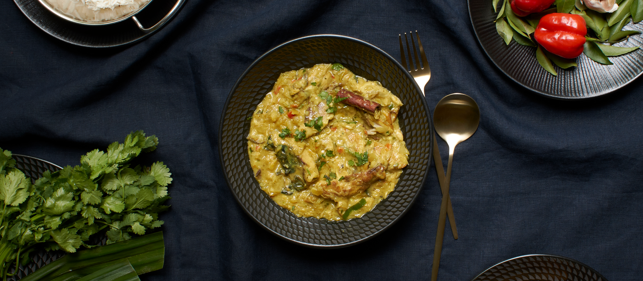 MALDIVIAN STYLE FISH CURRY - Seared mackerel fillet in a rich, tropical coconut curry sauce with pandan & scotch bonnet for a spicy coastal flavour.