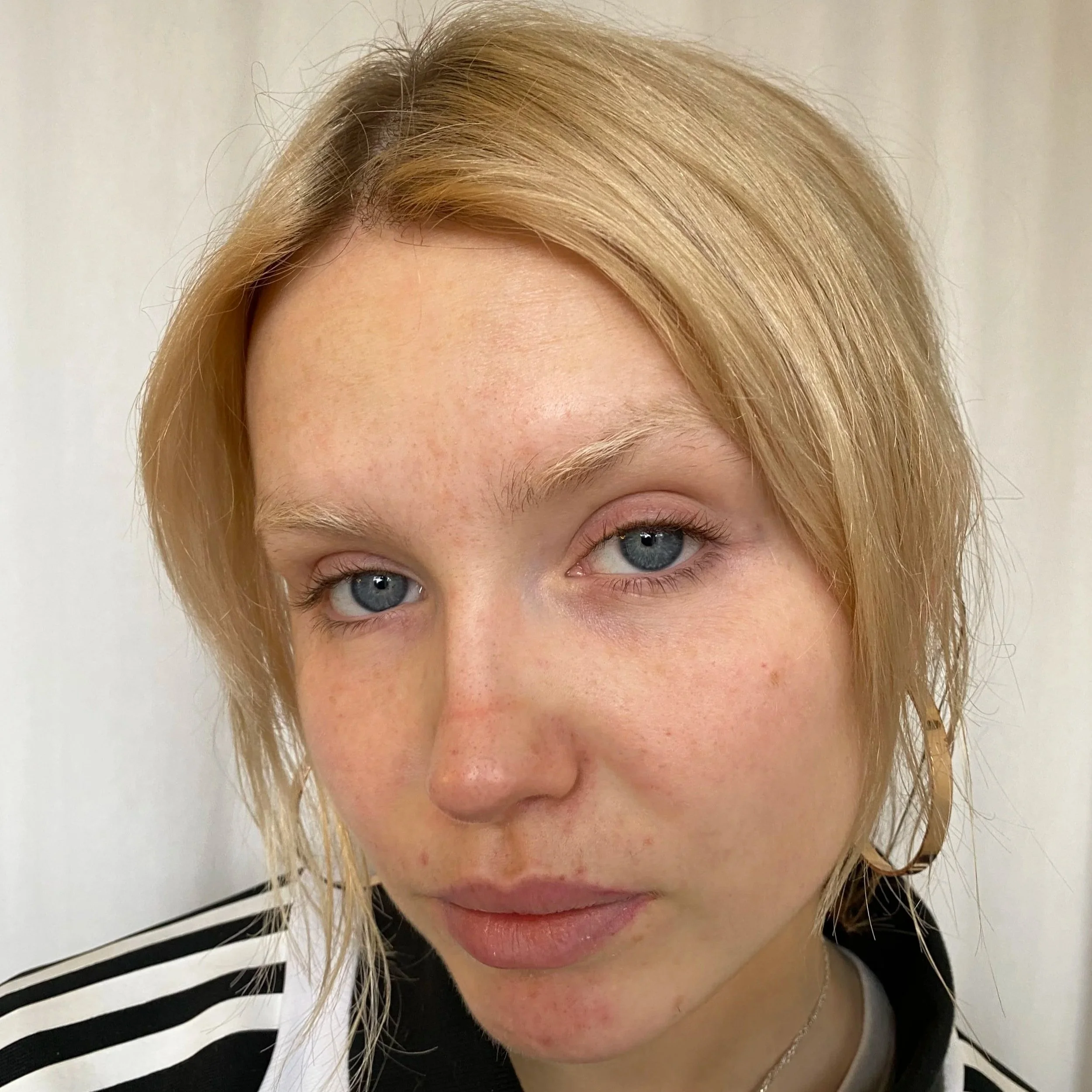 lucy blue wearing my bleach brow service Asma Docrat
