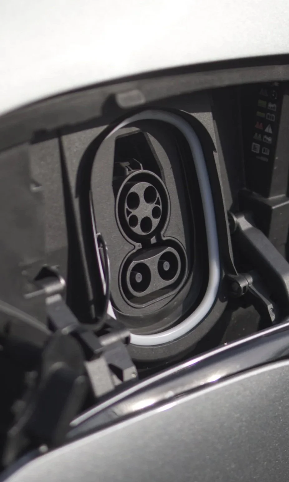Close-up of EV charging port, CSS1, Level 3 charging.