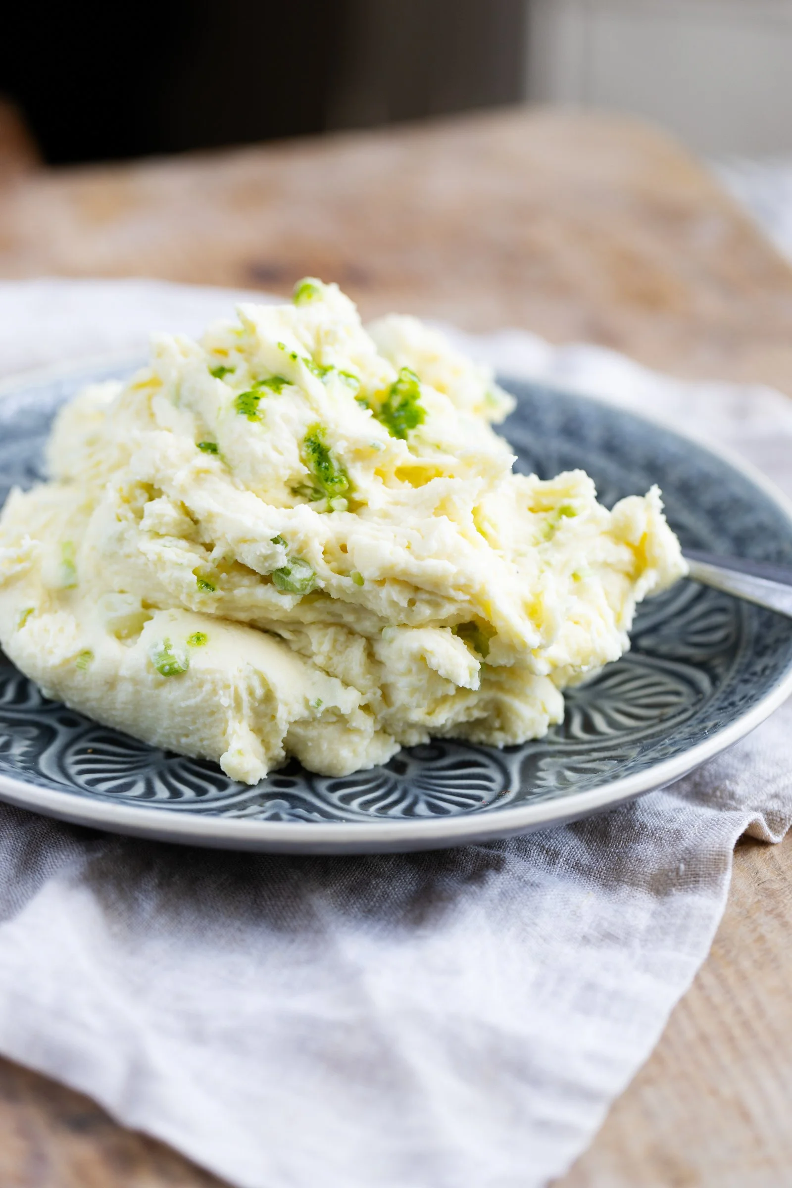 Champ: Creamy Irish potatoes with scallions, butter and milk, a comforting side dish for winter meats and gravy.