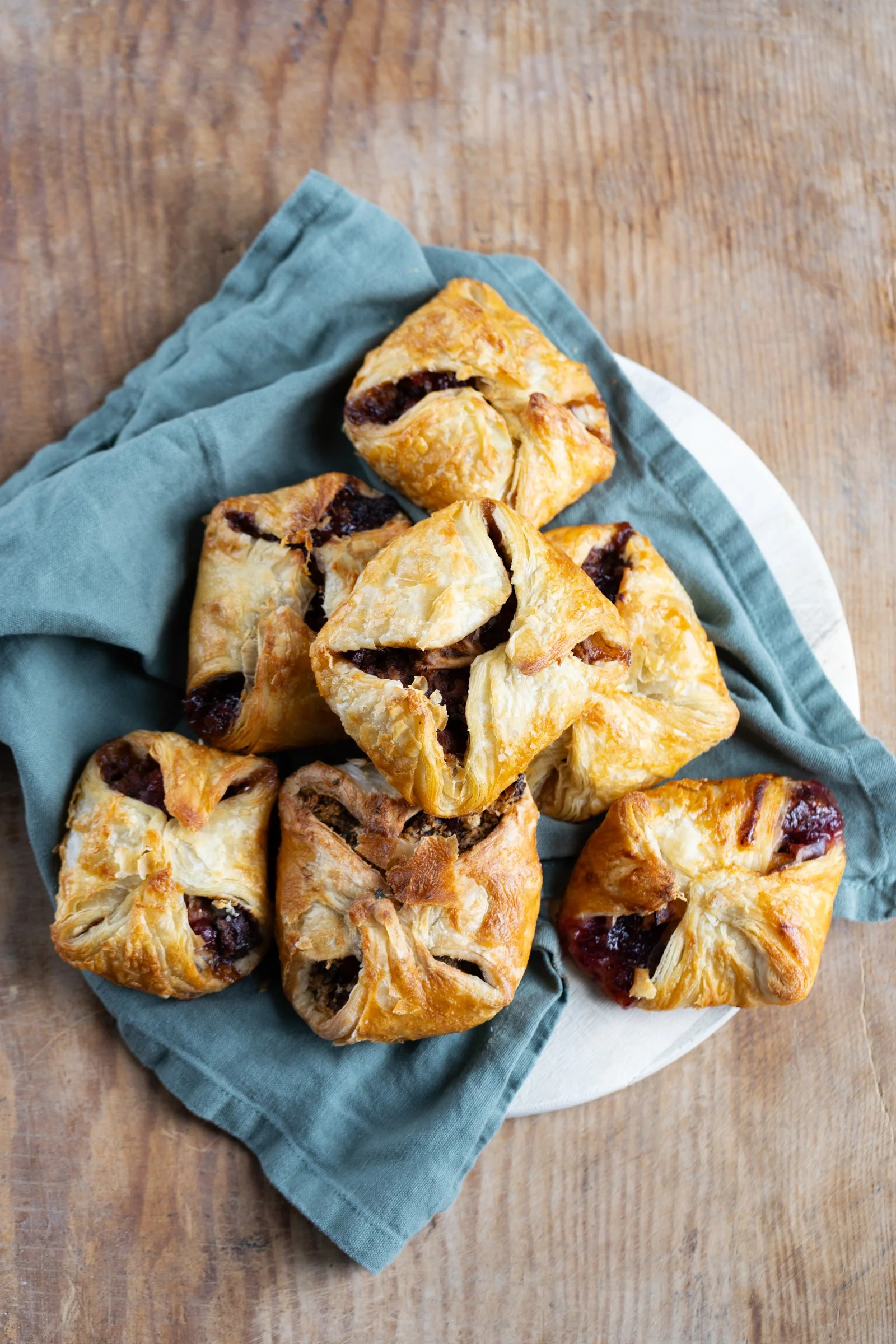 Christmas Jambons: Golden pastry parcels filled with ham, chicken, gravy, cranberry and stuffing.