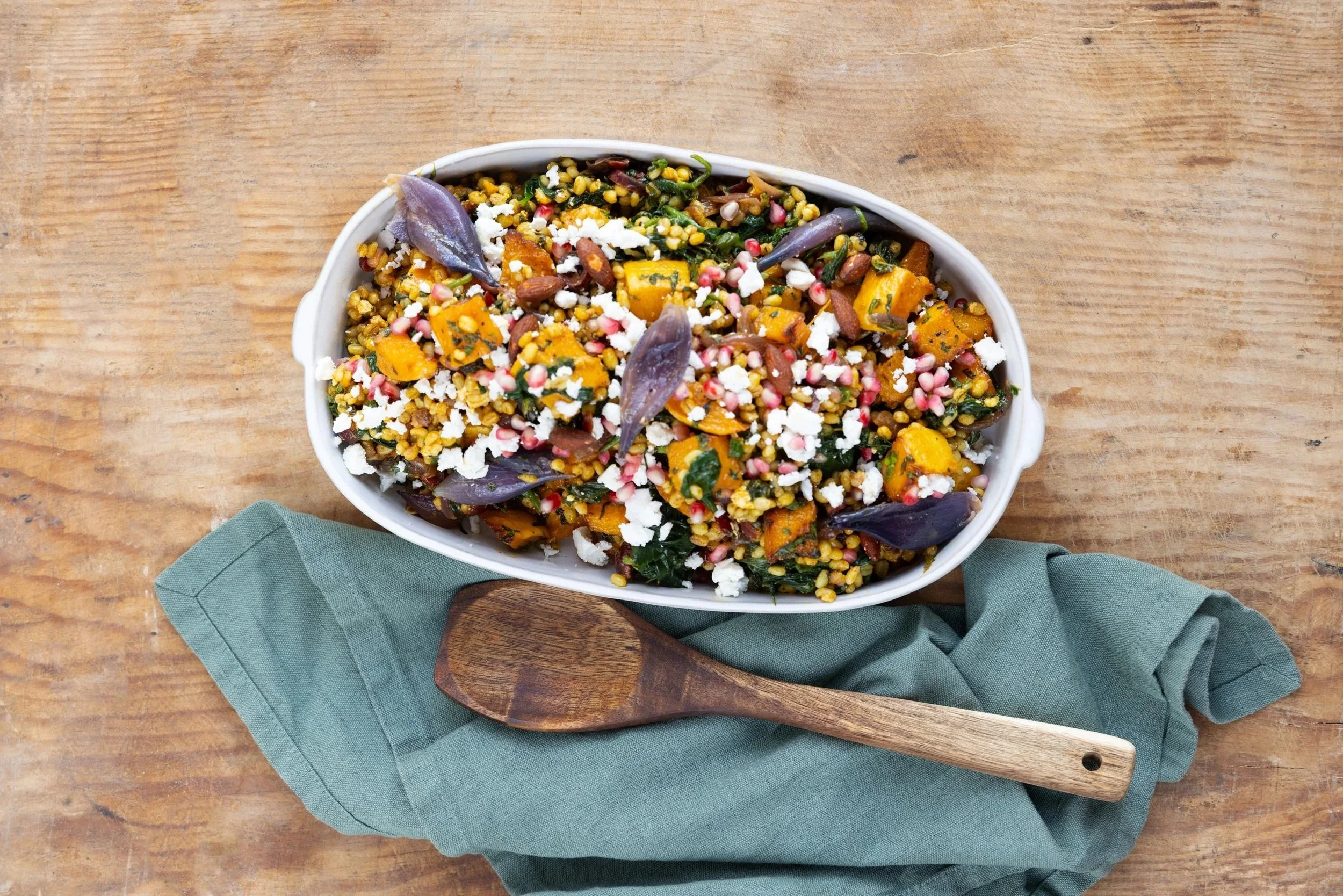 Barley Salad: Barley, roasted squash and red onion with feta, mint, seeds and pomegranate in a ginger and coriander dressing.