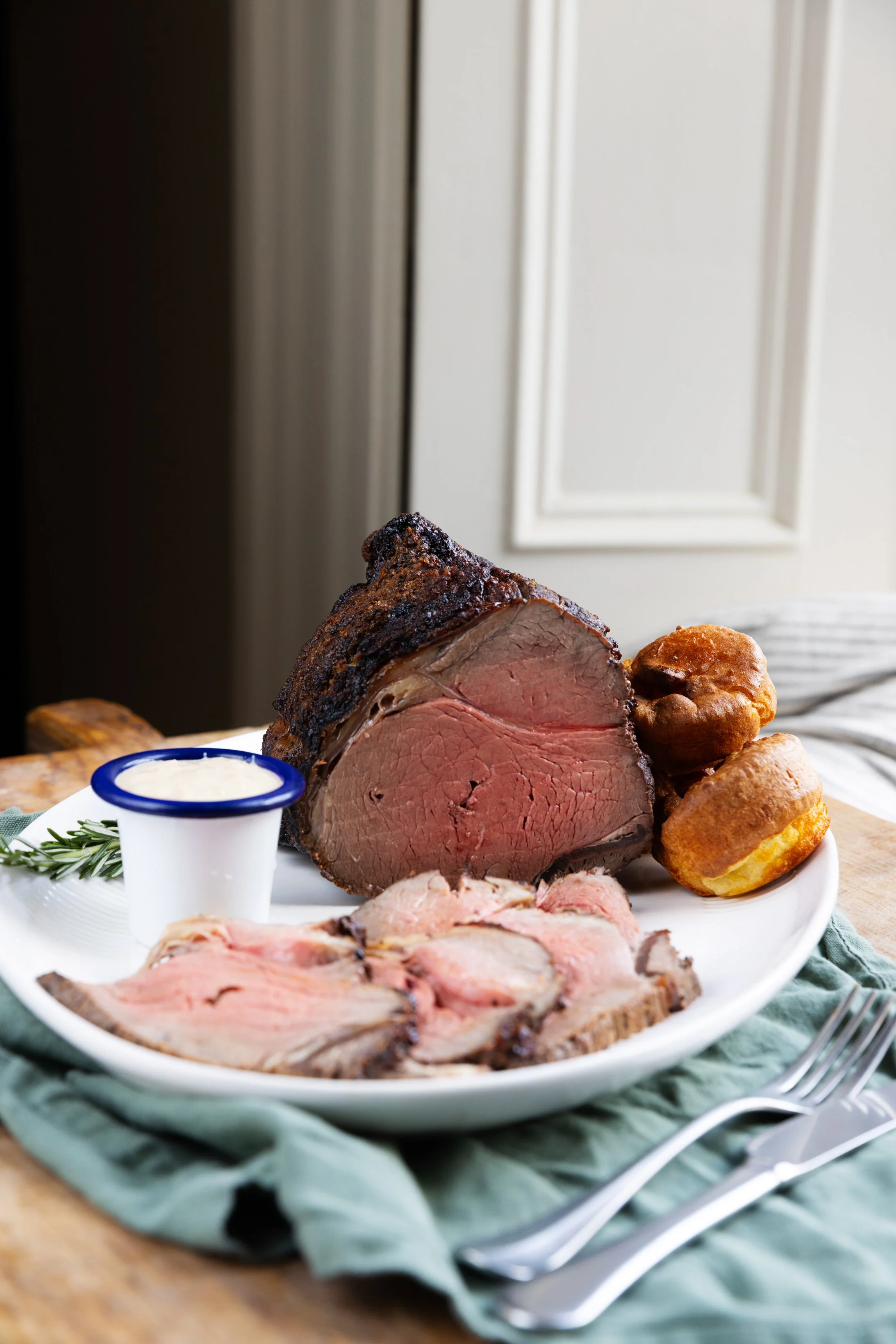 Roast Beef: Tender roast beef, made for carving and serving around the table.