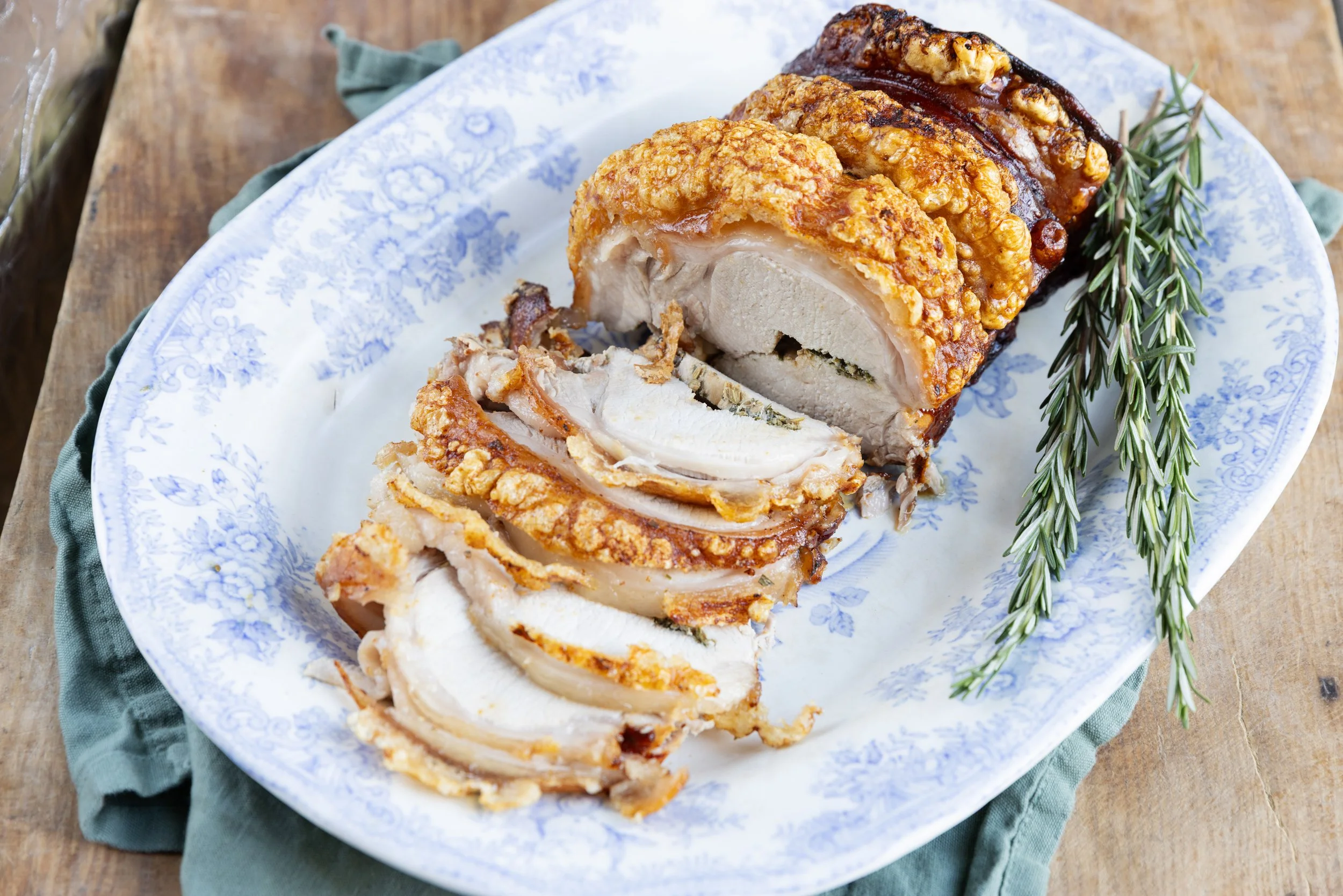 Roast Pork: Generous roast pork, roasted with herbs at the centre and with crispy crackling for a hearty winter gathering.