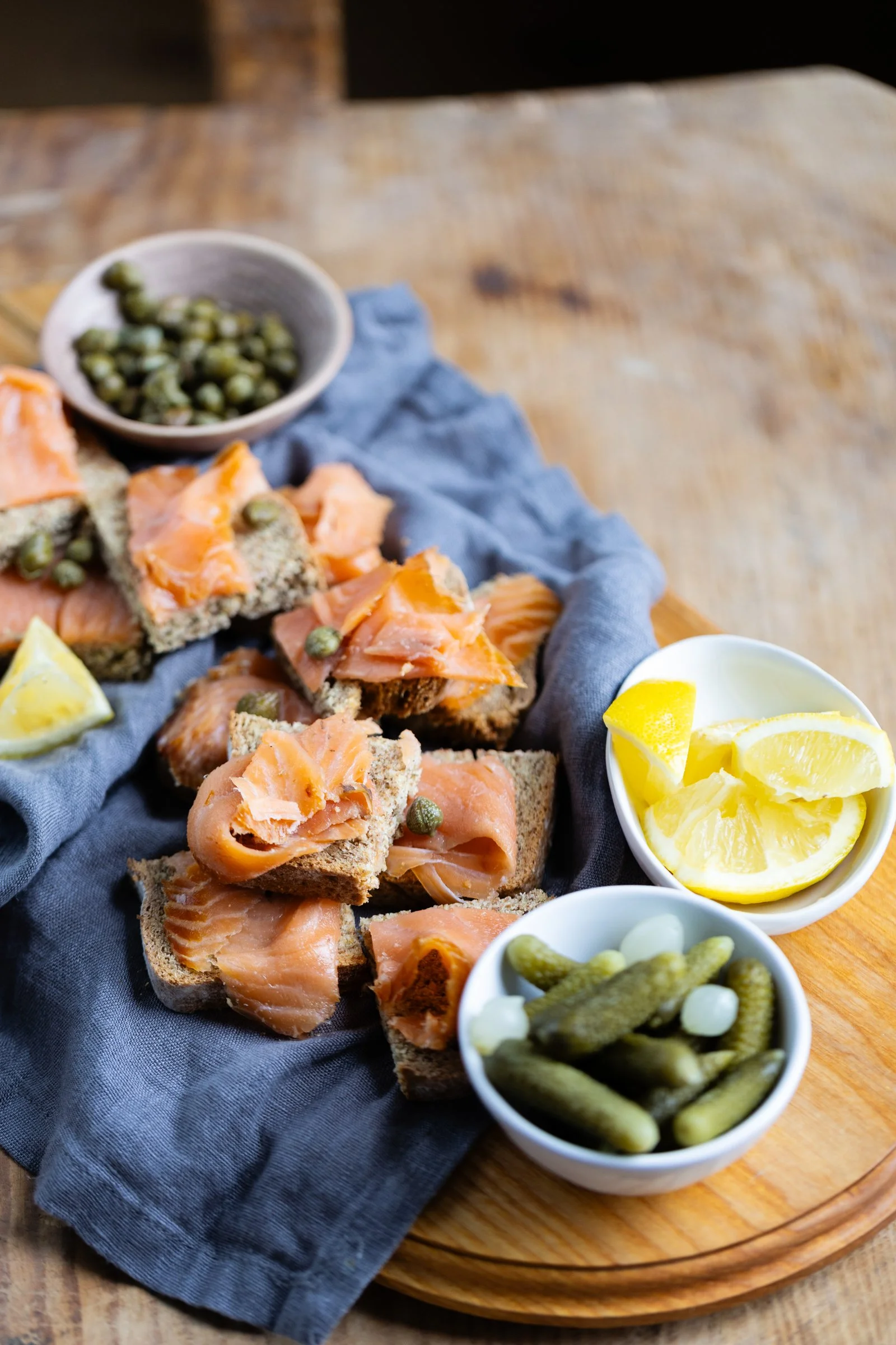 Smoked Salmon with Pickled Red Onions and Capers: Burren smoked salmon served with bright pickled red onions briny capers, and pickled onions