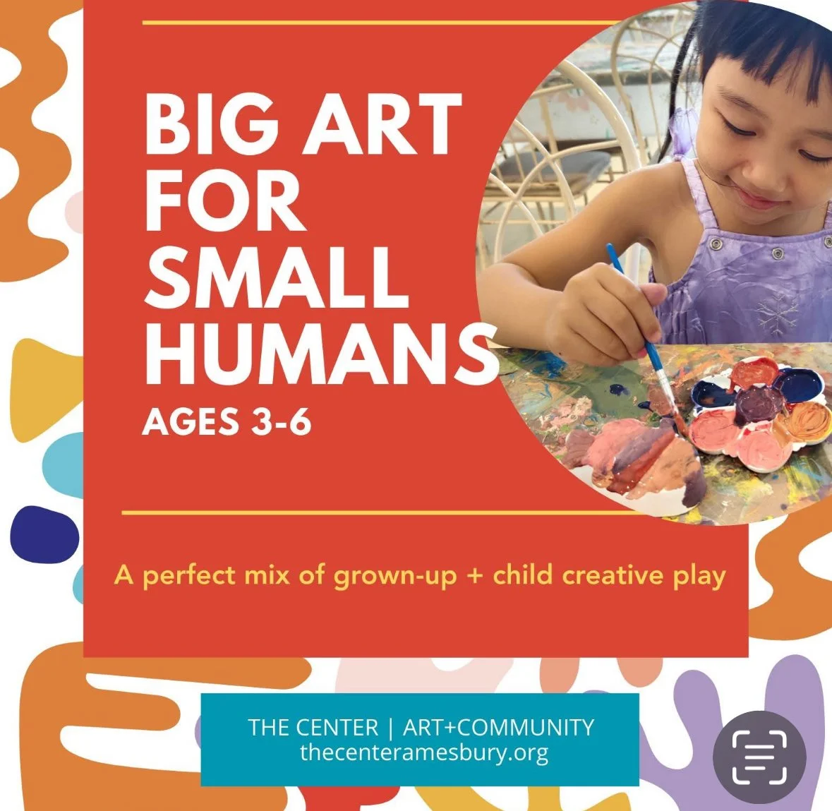 small child painting with shapes and colors