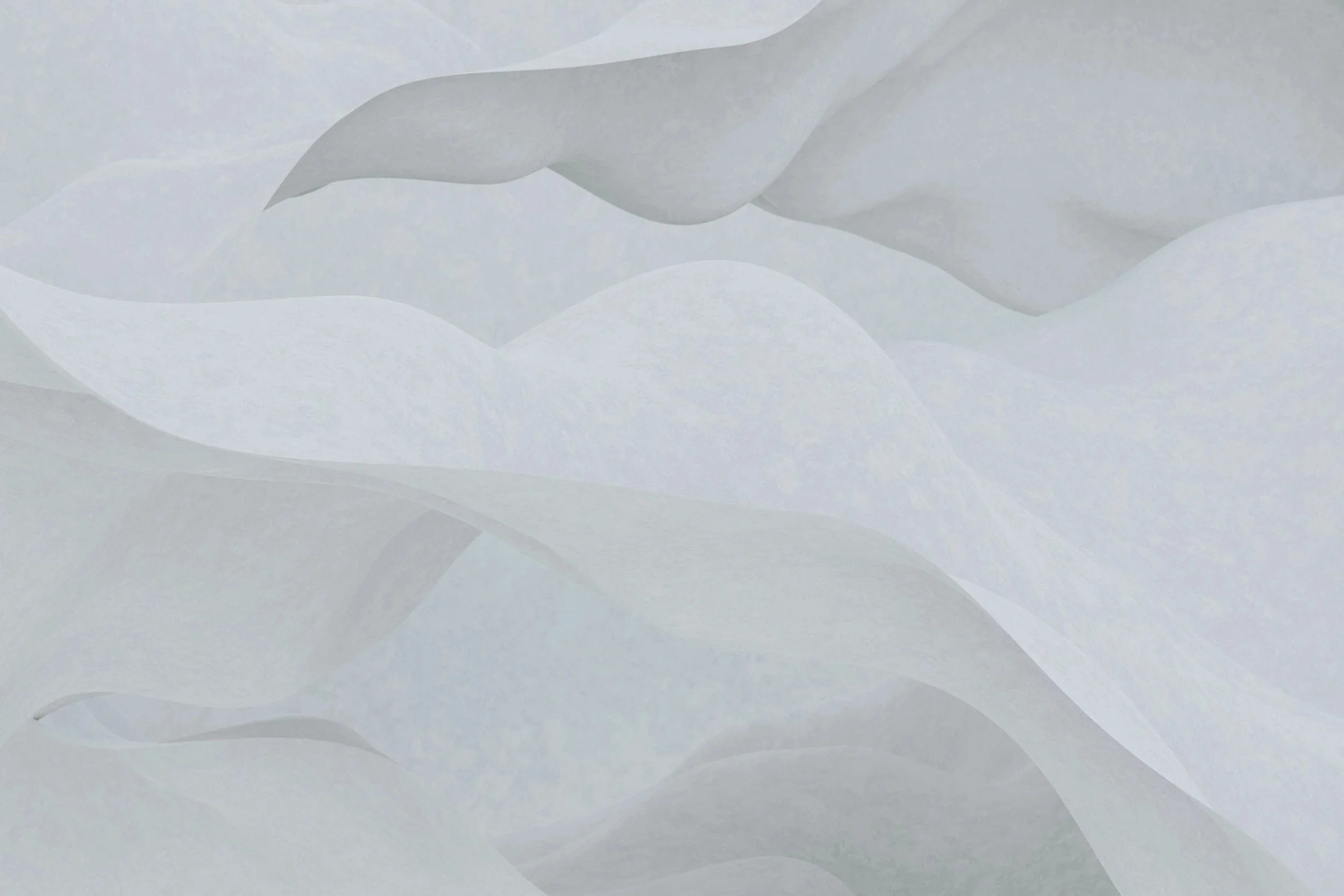 Abstract background with overlapping shapes in shades of white and light gray, resembling flowing paper or fabric.
