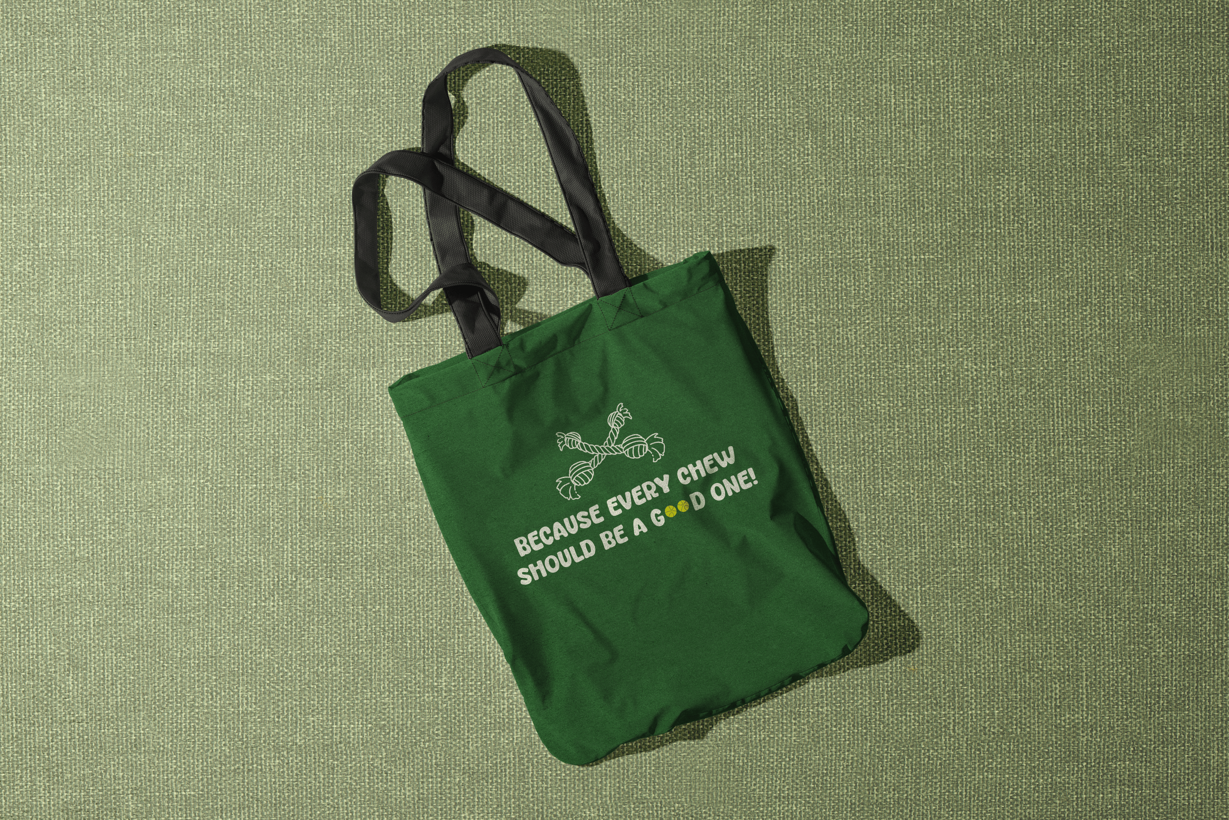 fabric-bag-on-green-background-top-view-min.png