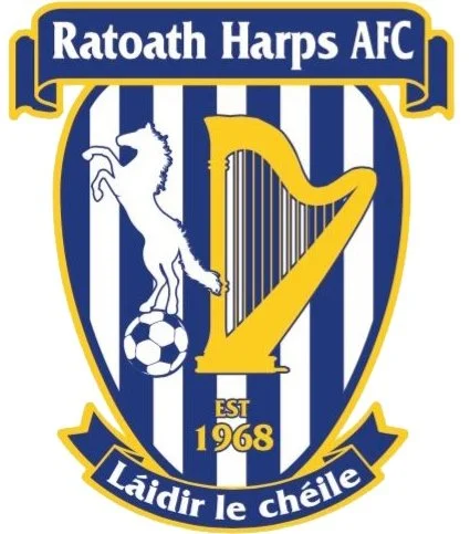 Logo of Ratoath Harps AFC featuring a harp, a running horse with a soccer ball, and the text "Ratoath Harps AFC," "EST 1968," with a banner in Gaelic that reads "Láidir le chéile."