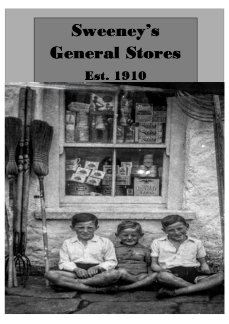 Black and white photo of three children sitting outside a store with a sign reading "Sweeney's General Stores, Est. 1910." The children are smiling and sitting cross-legged, with shelves of goods visible behind them.