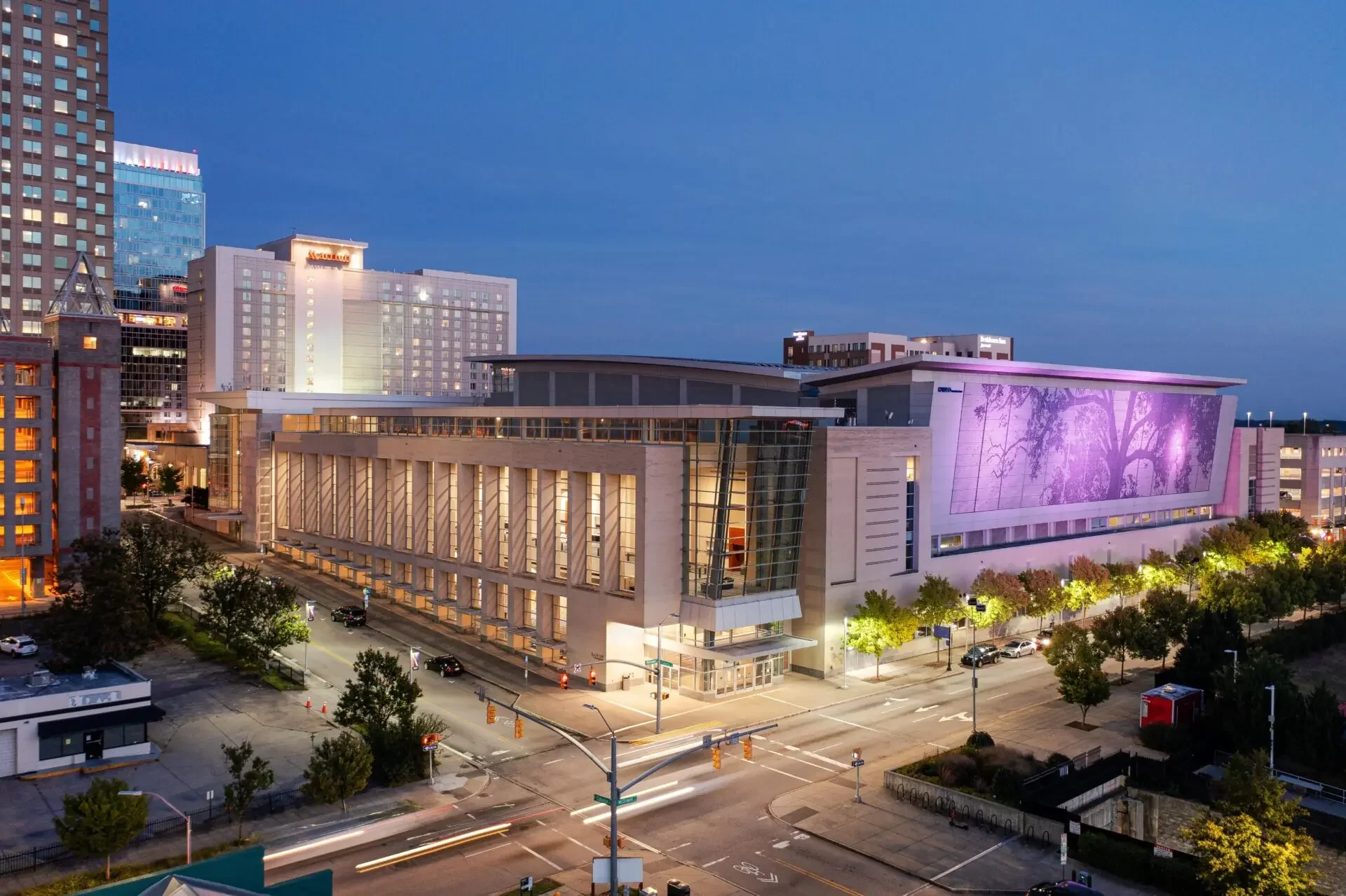 Raleigh Convention Center with skyline in evening