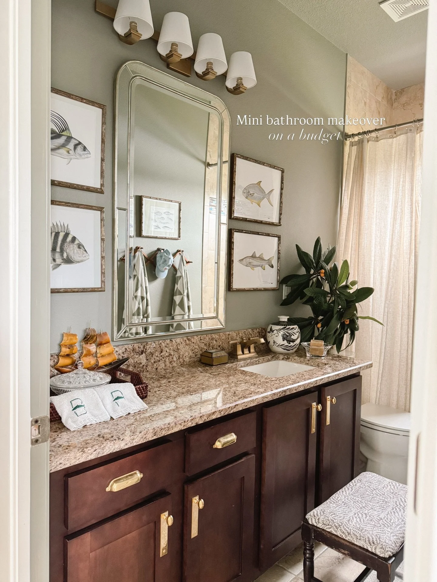 Final reveal of the Fish House boy&rsquo;s bath

A true testament to how changing key elements make a huge impact. I painted, swapped mirror, hardware and shower trim, then used rub &lsquo;n&rsquo; buff to repurpose the light fixture &amp; faucet. Th