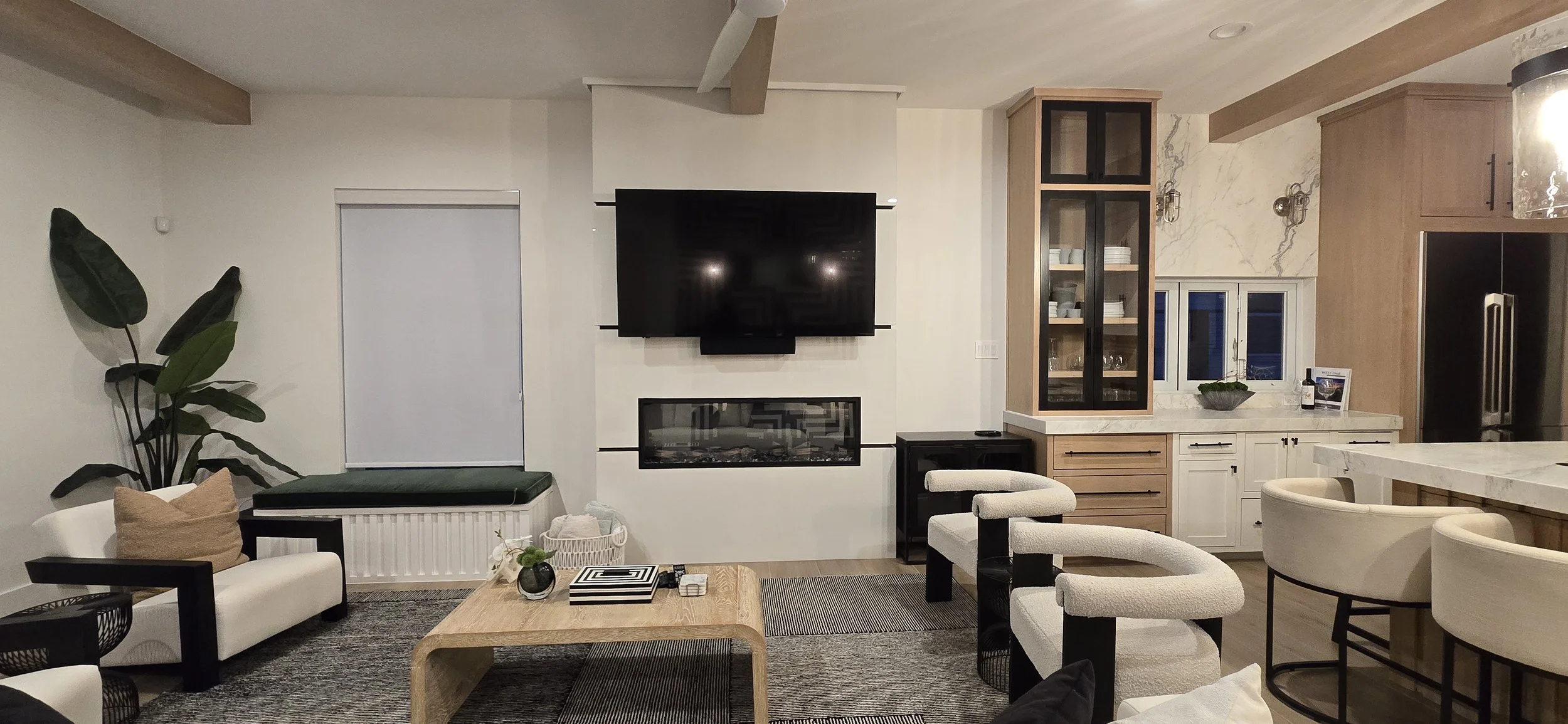 Finished living room with wall-mounted TV and clean, hidden wiring