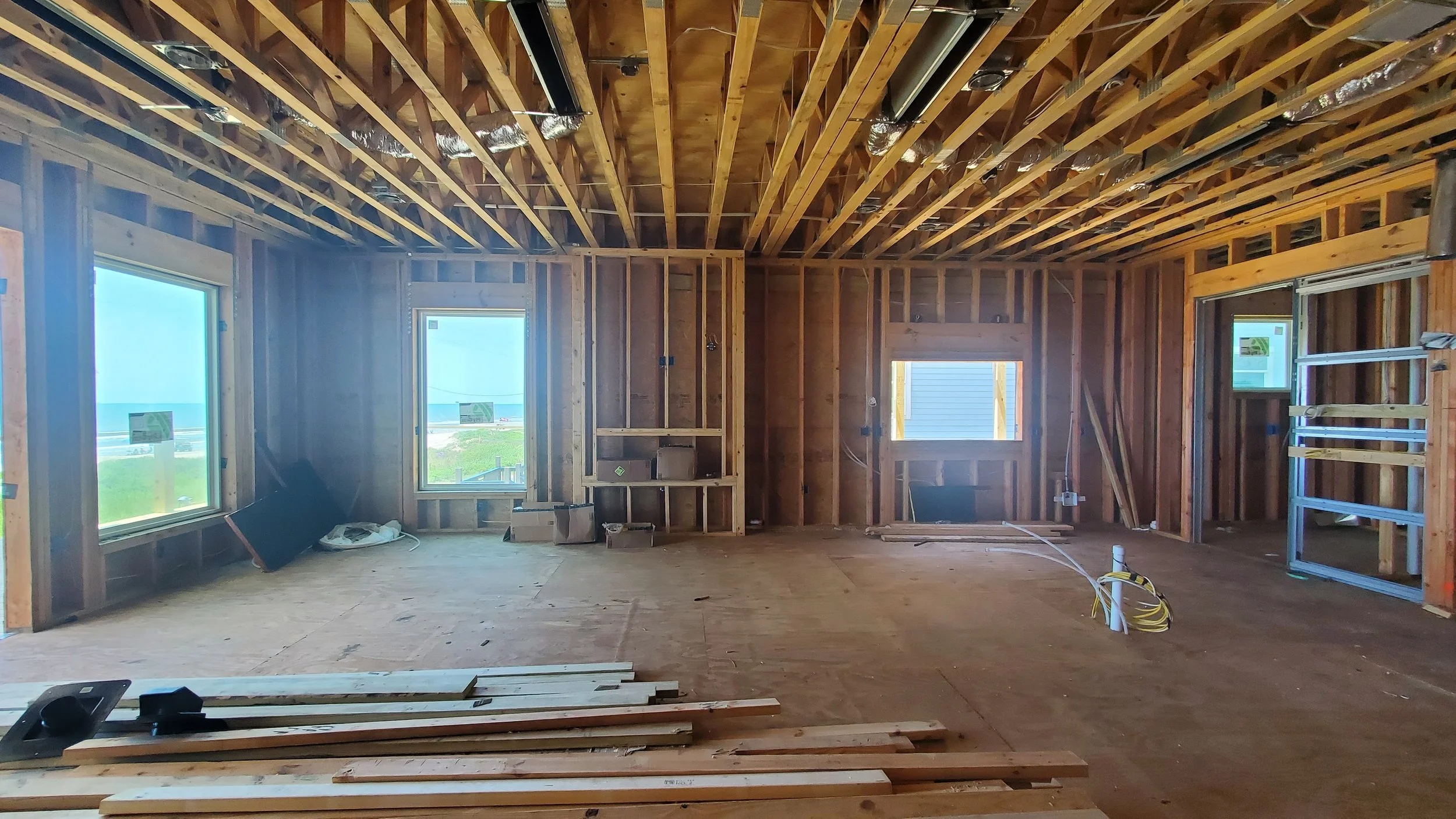 Custom bay house, framing, living area