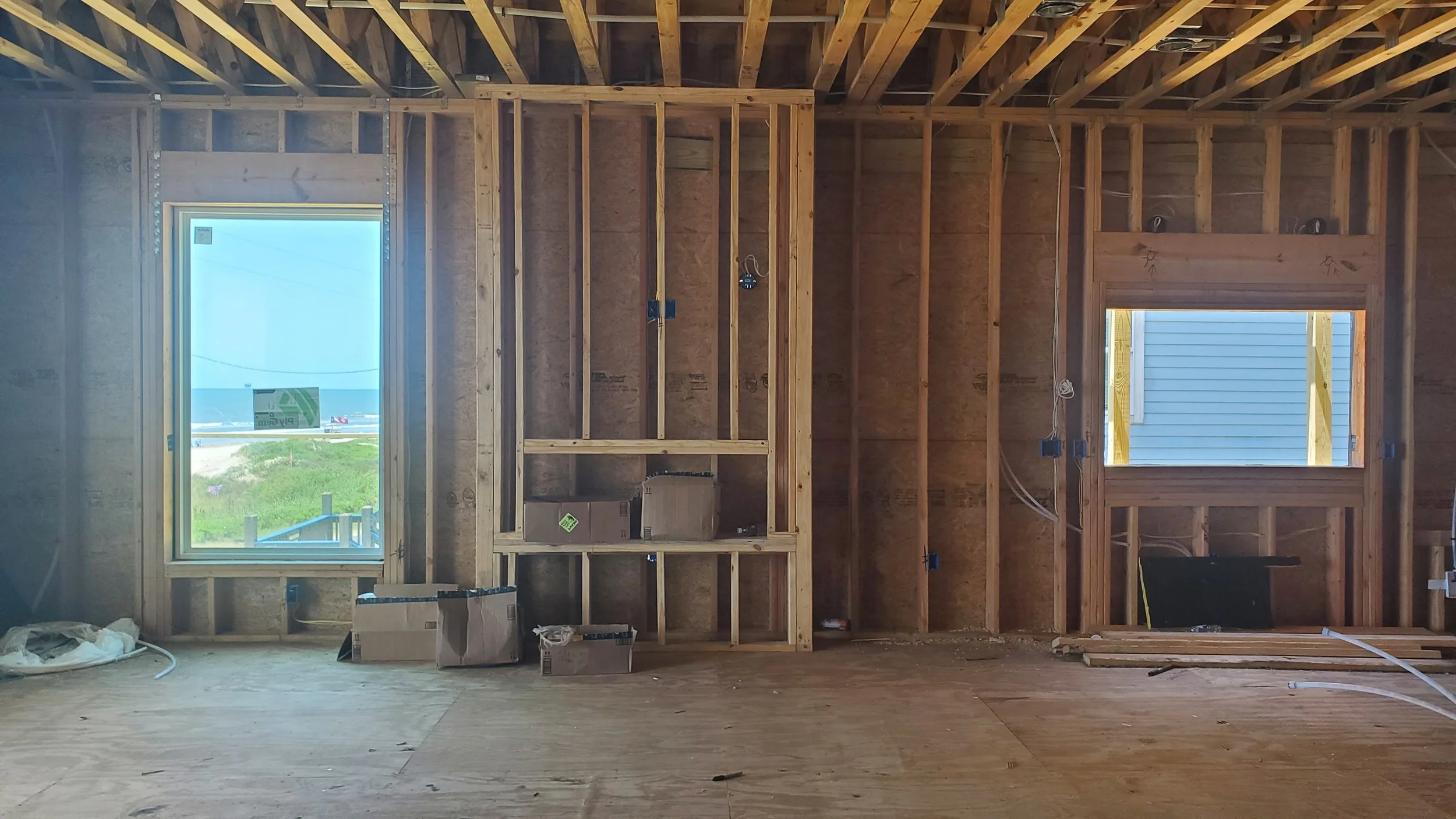 Custom bay house, framing, media room