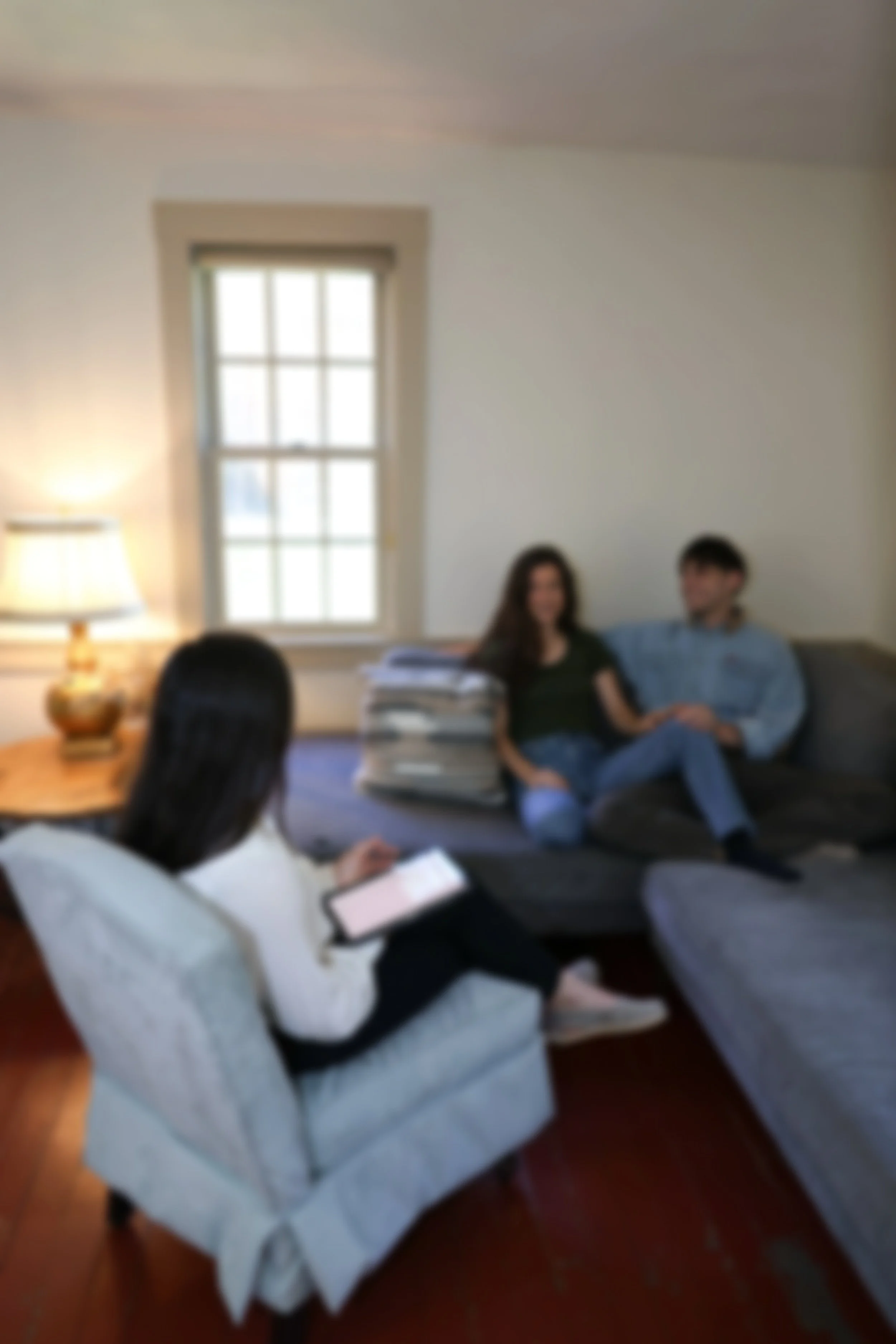 A couple in couples counseling with Caroline Furcolo.