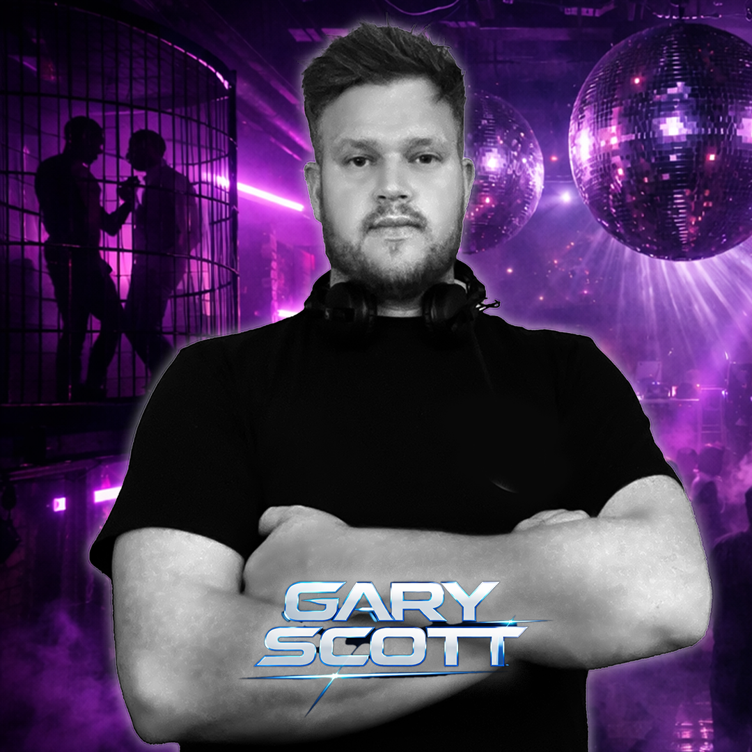 drag queen in a brown corridor in big blonde wig, sequin dress and black boa