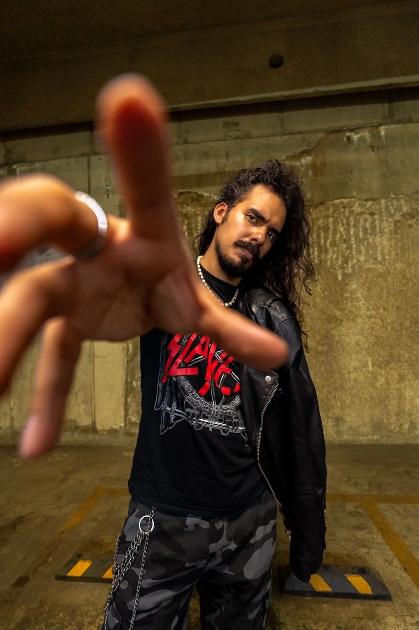Representative image of a scene regular at a live music venue with the quote “Live music is how I reset after work.”