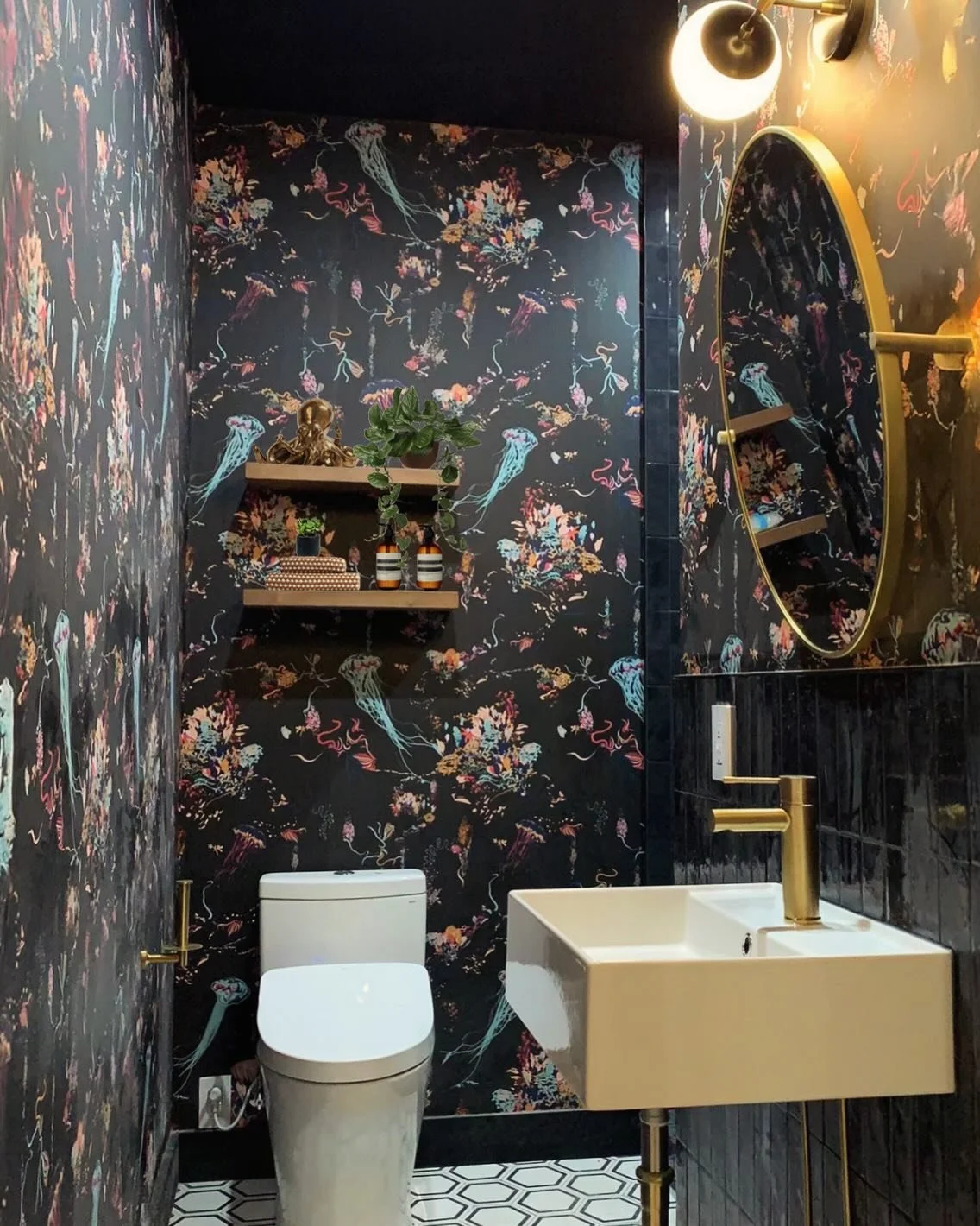 This guest bath glow-up has us feeling totally jelly!🪼 It&rsquo;s everything we love: cozy, eye-catching, and sophisticated. Swipe to see the before and rendering of this wave-making completed space designed by us 🌊