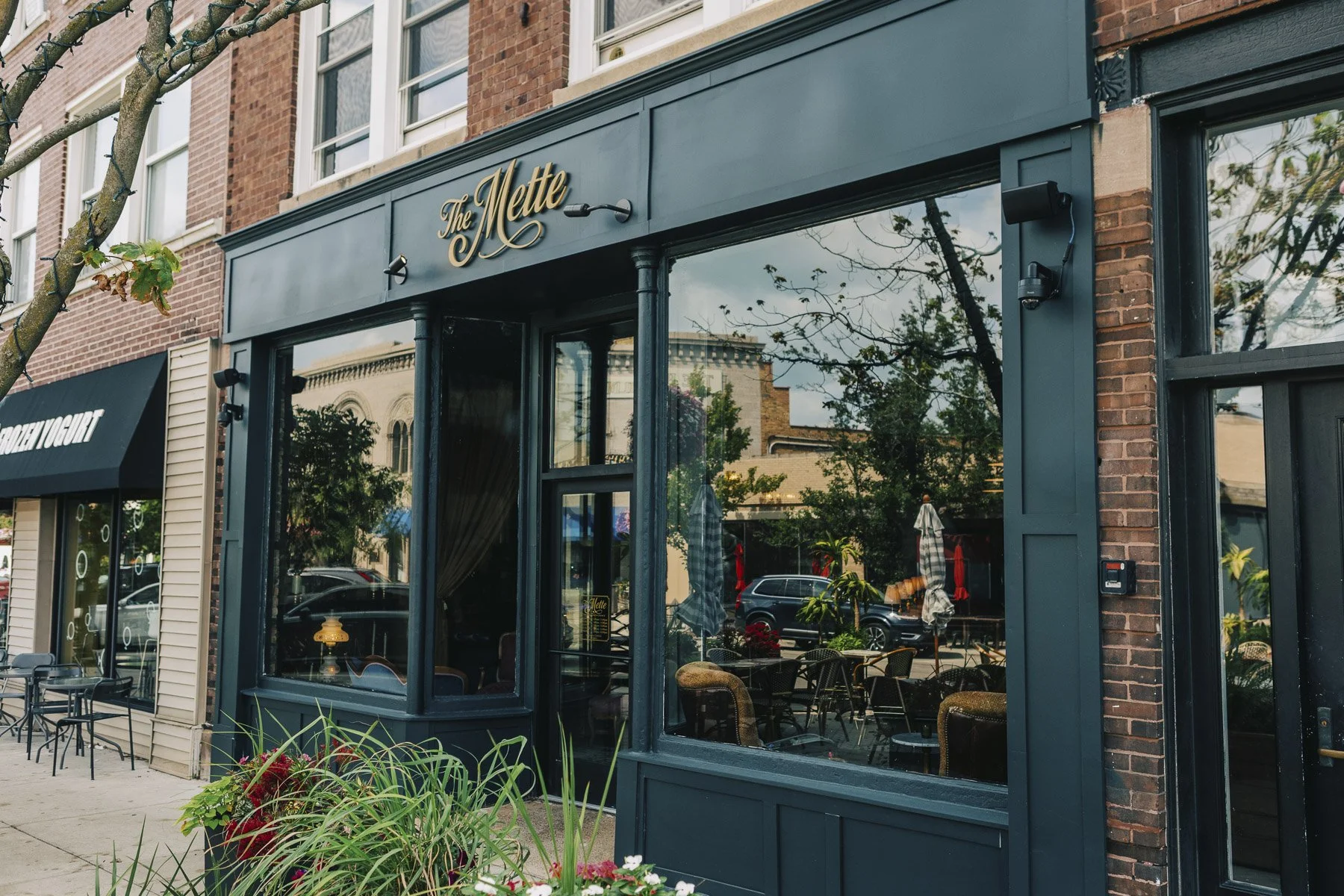Exterior storefront and signage at The Mette cocktail bar and lounge in Wilmette, Illinois