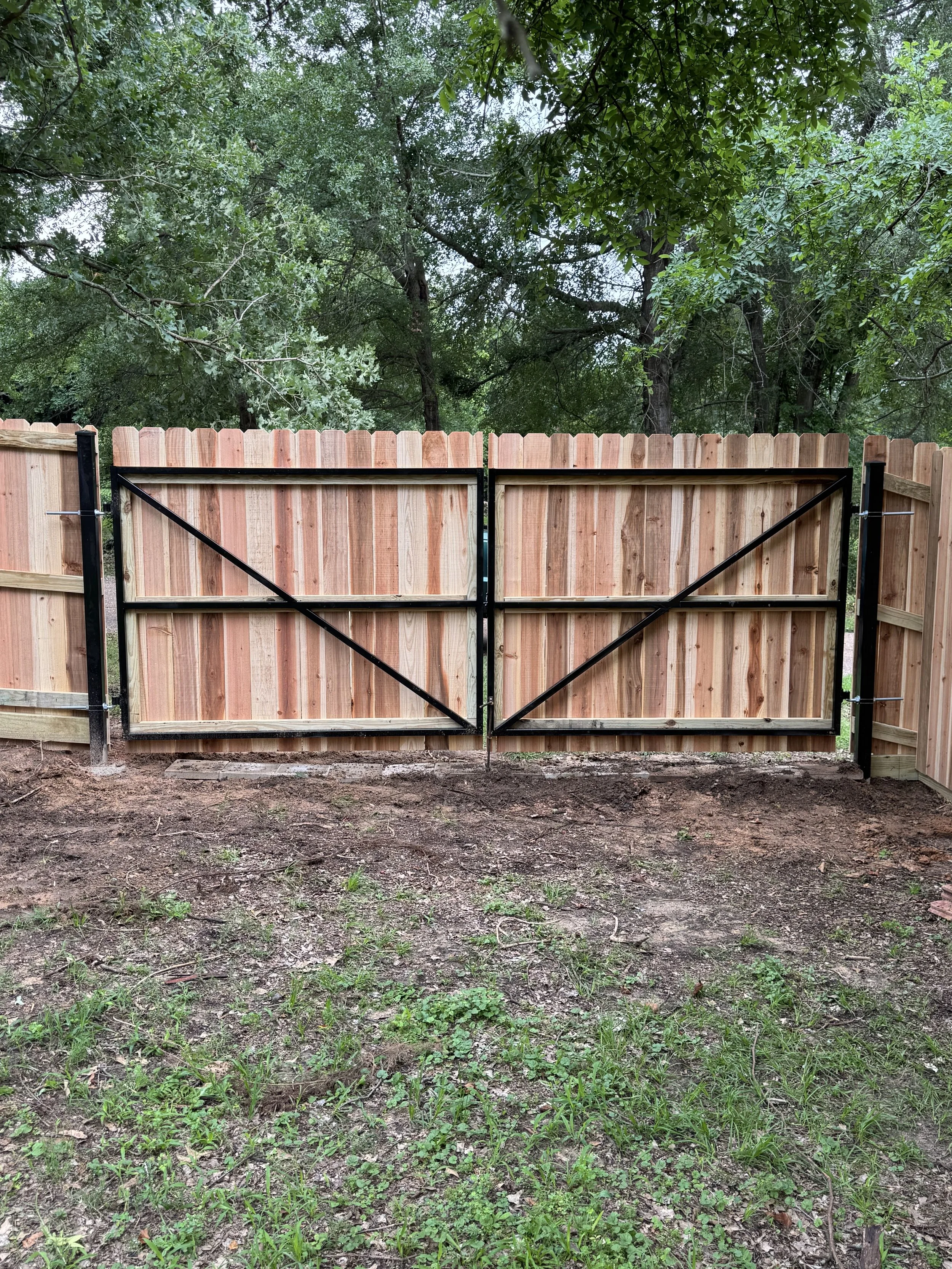 Double swing steel framed privacy fence gate .