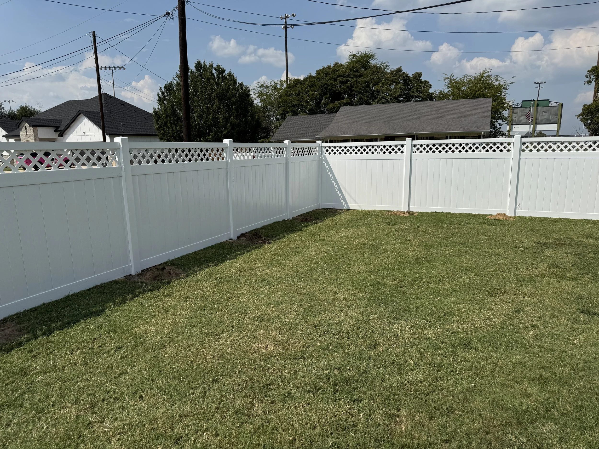White vinyl privacy fencing 