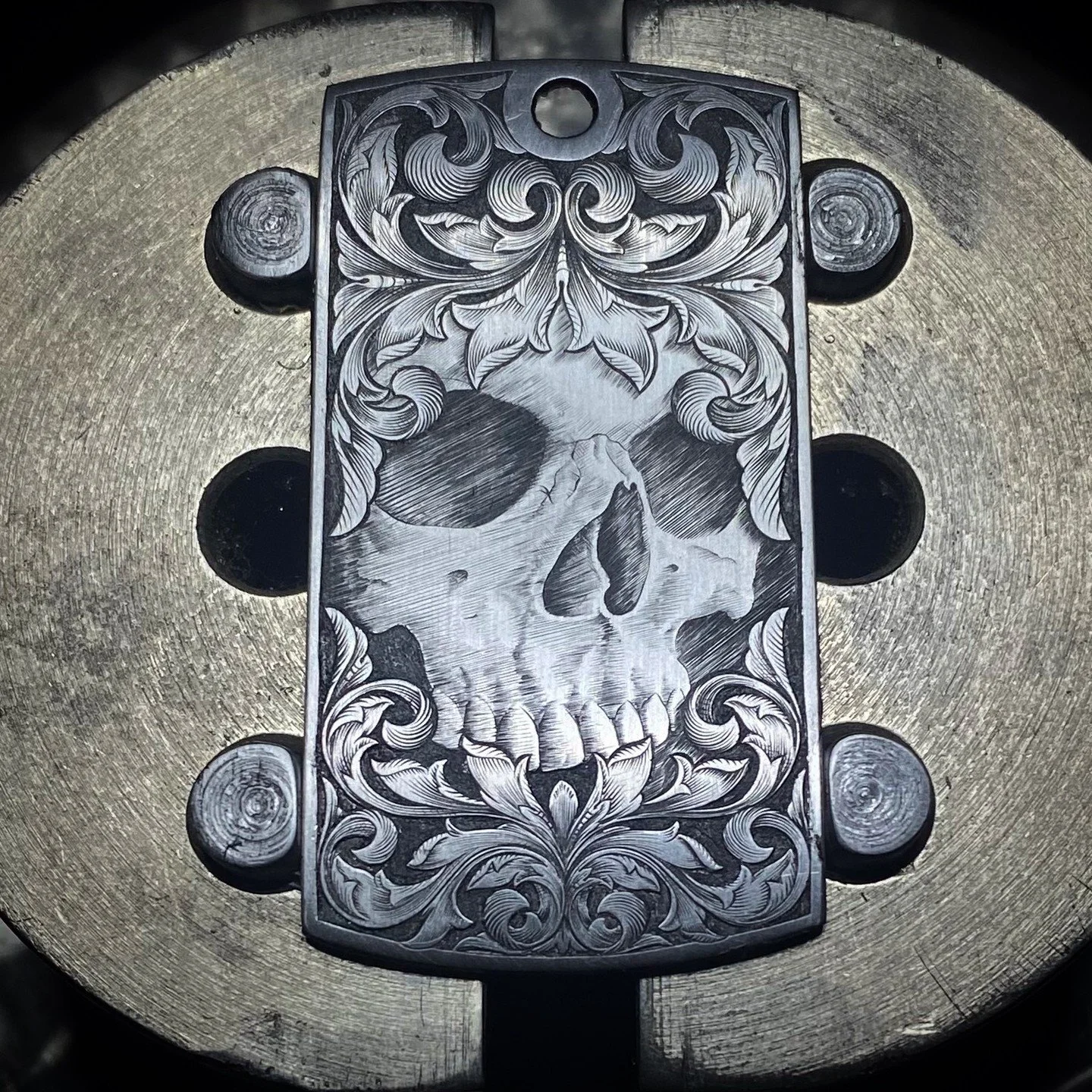 Hand Made, 2' , Stainless steel Dog tag with skull and acanthus leaves. #handengraving
#metalengraving
#jewelryengraving
#dogtagswithswag 
#Customengraving
#dogtags 
#Engravedjewelry
#Engravedmetal
#Engravingartist
#Engravedartwork
#Engravedpendant
#