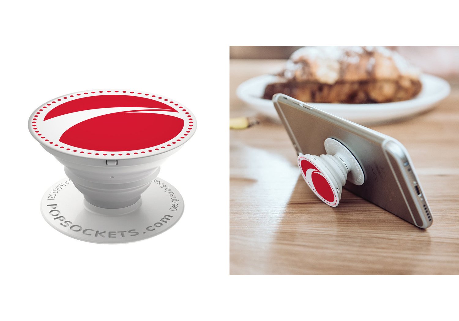 PopSocket phone grip with red and white design, shown attached to a phone on a wooden table.