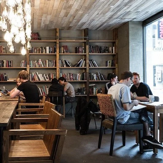 A library filled with student studying.