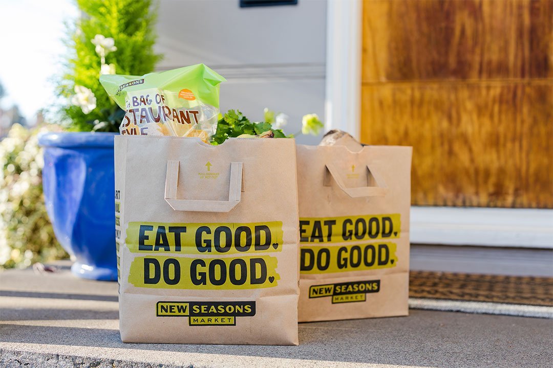 Bag of groceries sitting the front porch