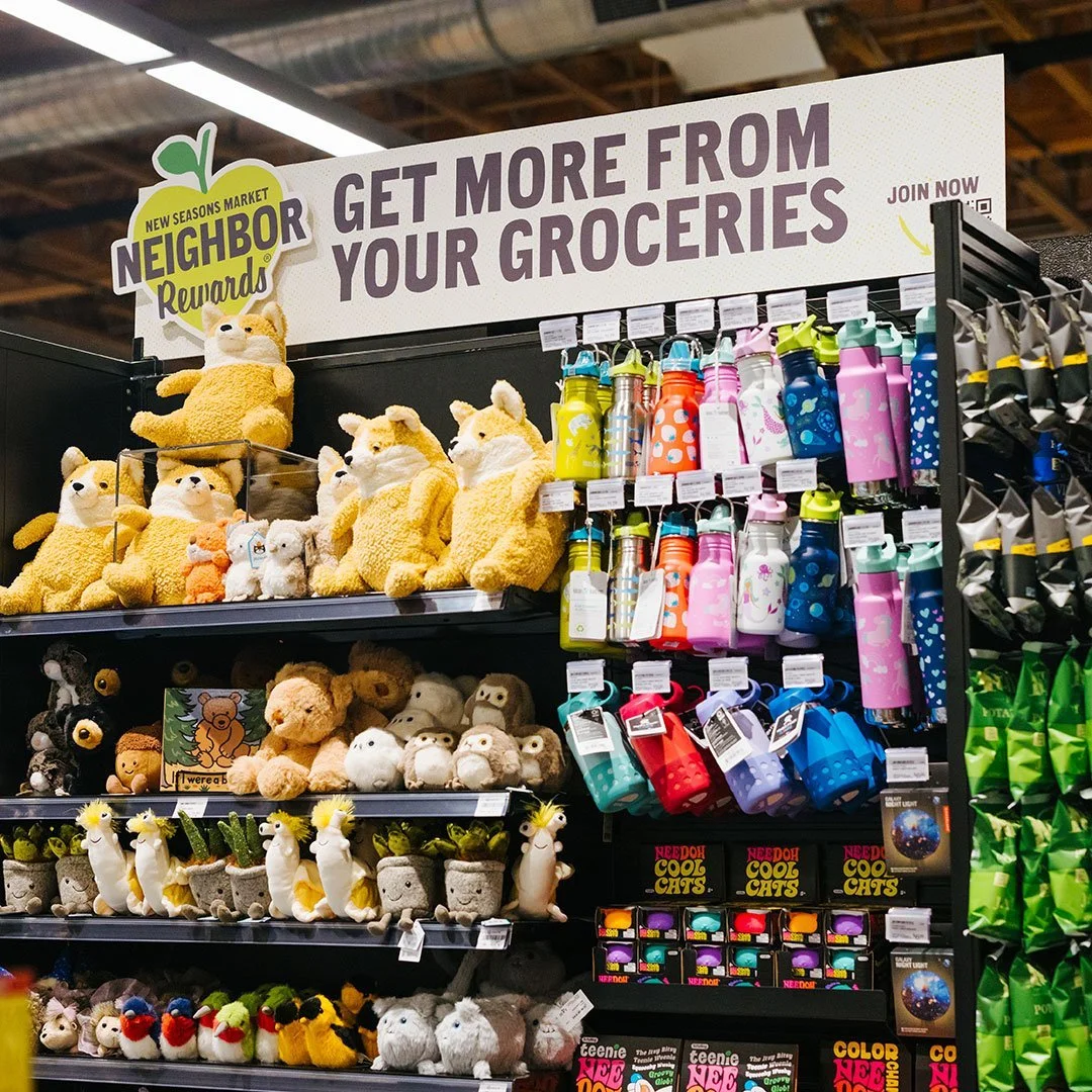 Image of end cap promoting loyalty program in-store