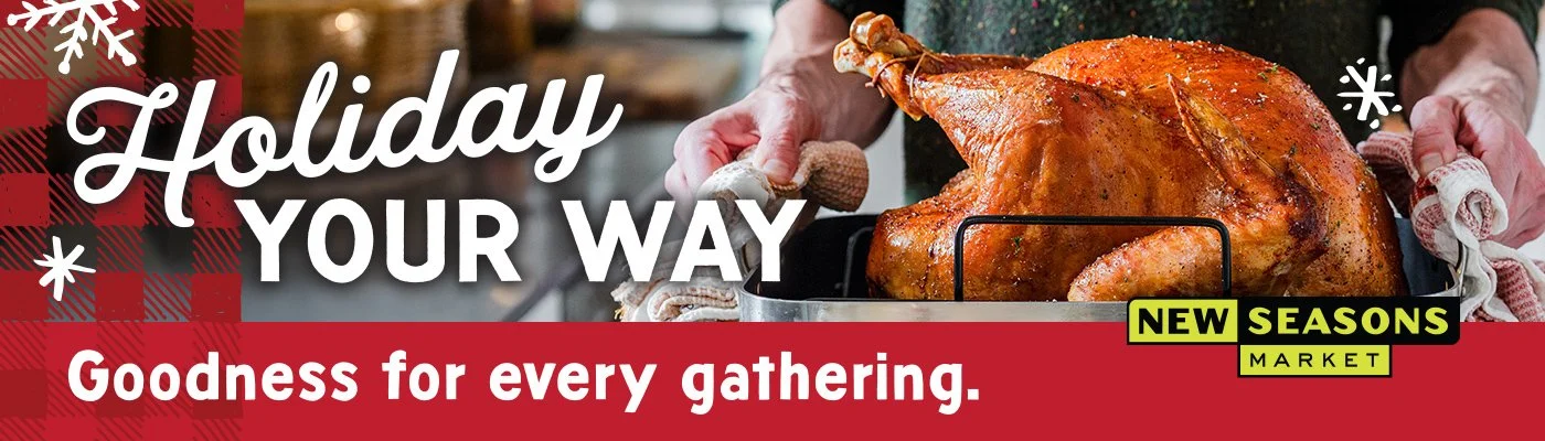 A large image of someone holding a cooked turkey, this was the large billboard that was up during the holiday