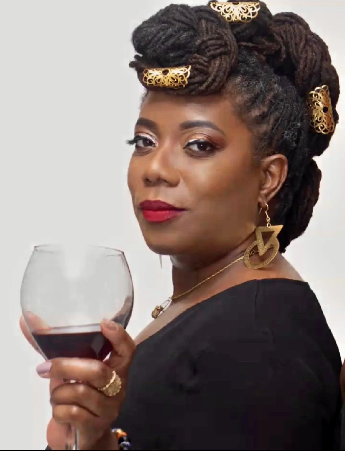 Christal Floyd Is Pouring Purpose Into Every Bottle with Divine Libations