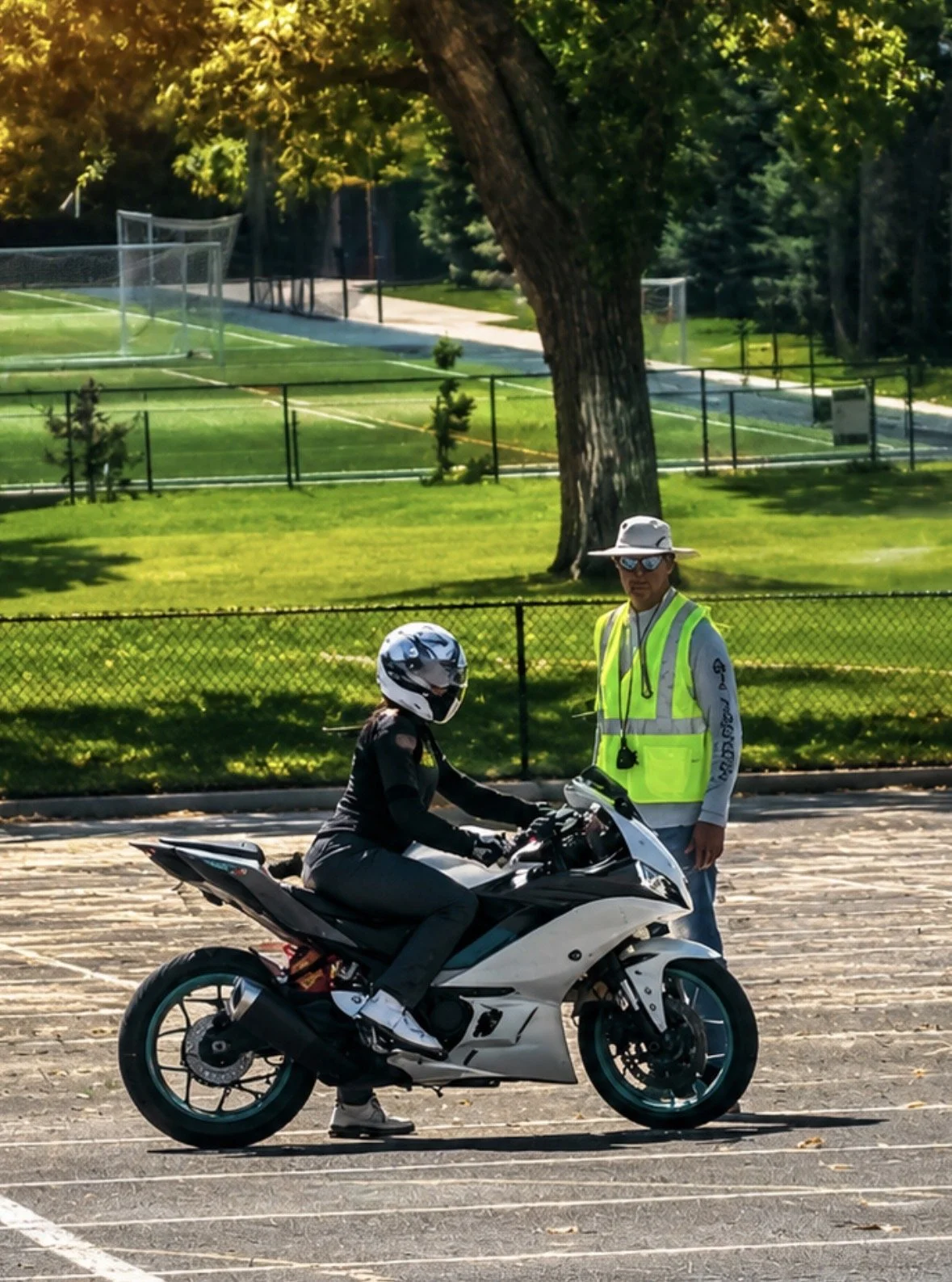 RiderCoach working directly with a student on a sport motorcycle